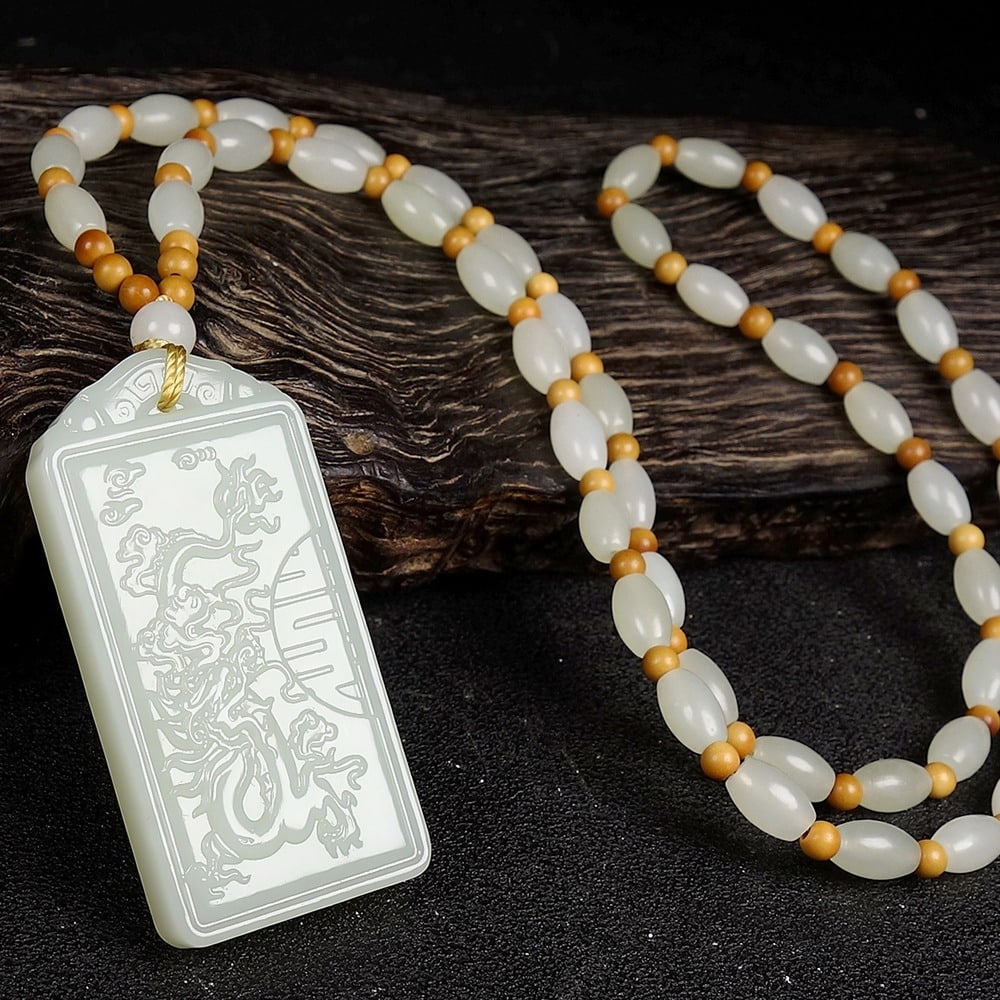 An Exquisite White Jade Dragon Pattern Pendant (1 of 6)