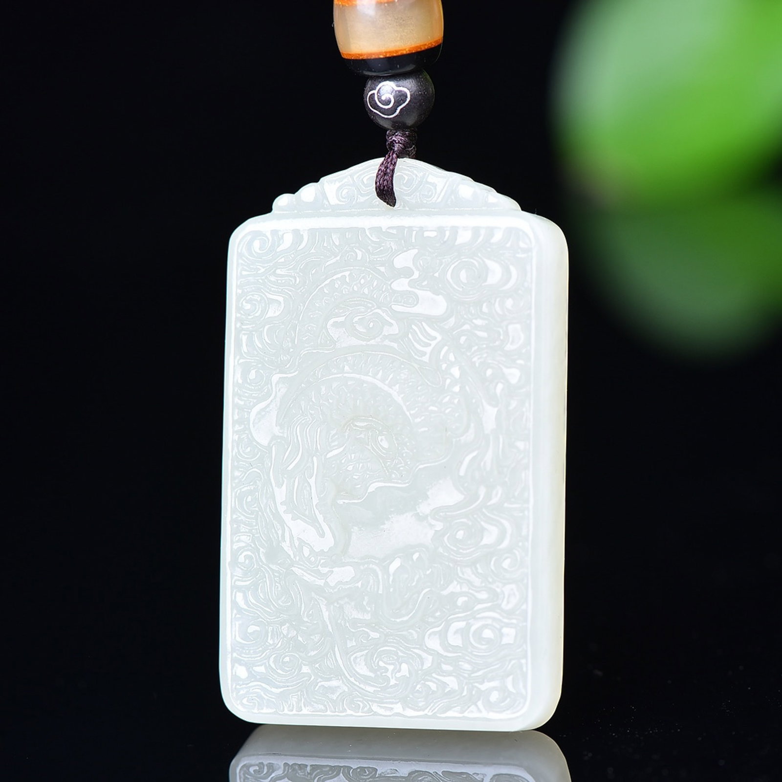 An Exquisite White Jade Auspicious Cloud and Dragon Pattern Pendant (1 of 5)