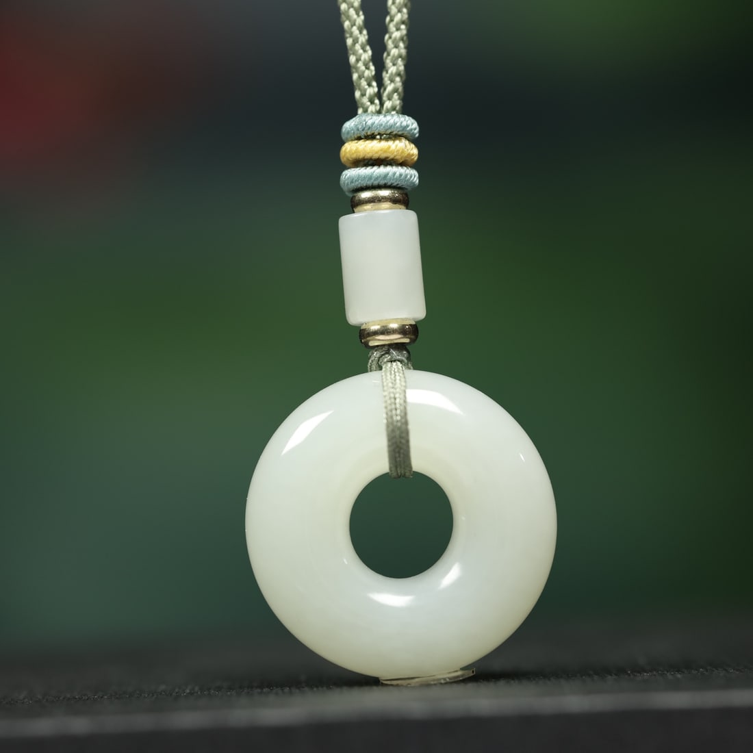 An Exquisite White Jade Pendant: An Exquisite White Jade Pendant,Size:24mmx8mm mm (寓意)简单就是一种美,特色靓丽,吉祥保平安 