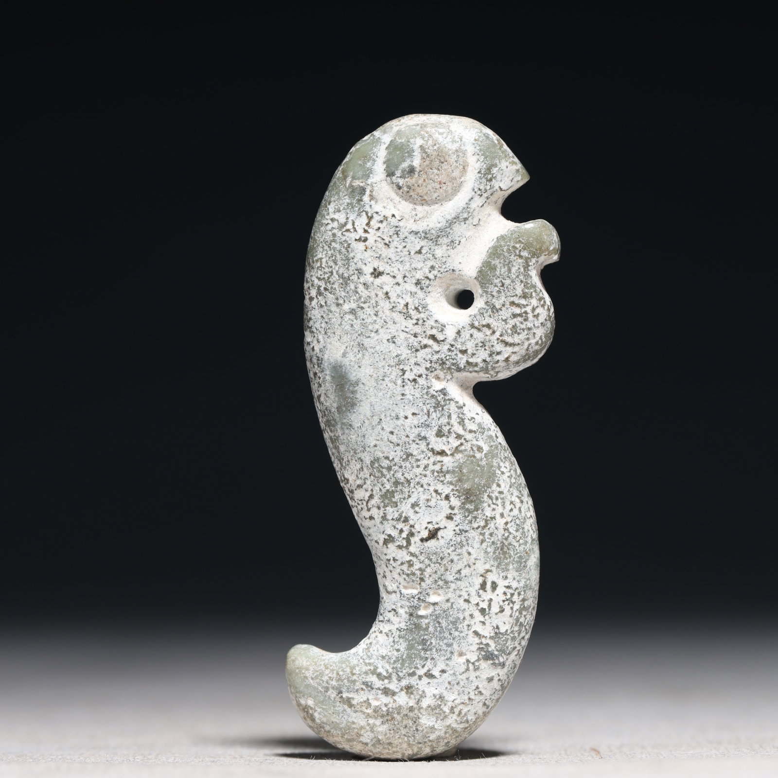 An Archaic Hongshan Culture Cyan jade Pendant: An Archaic Hongshan Culture Cyan jade Pendant,Ancient Time, China,Size:1inx2.6in Weight:34.2g 红山文化青玉挂件,新石器时期