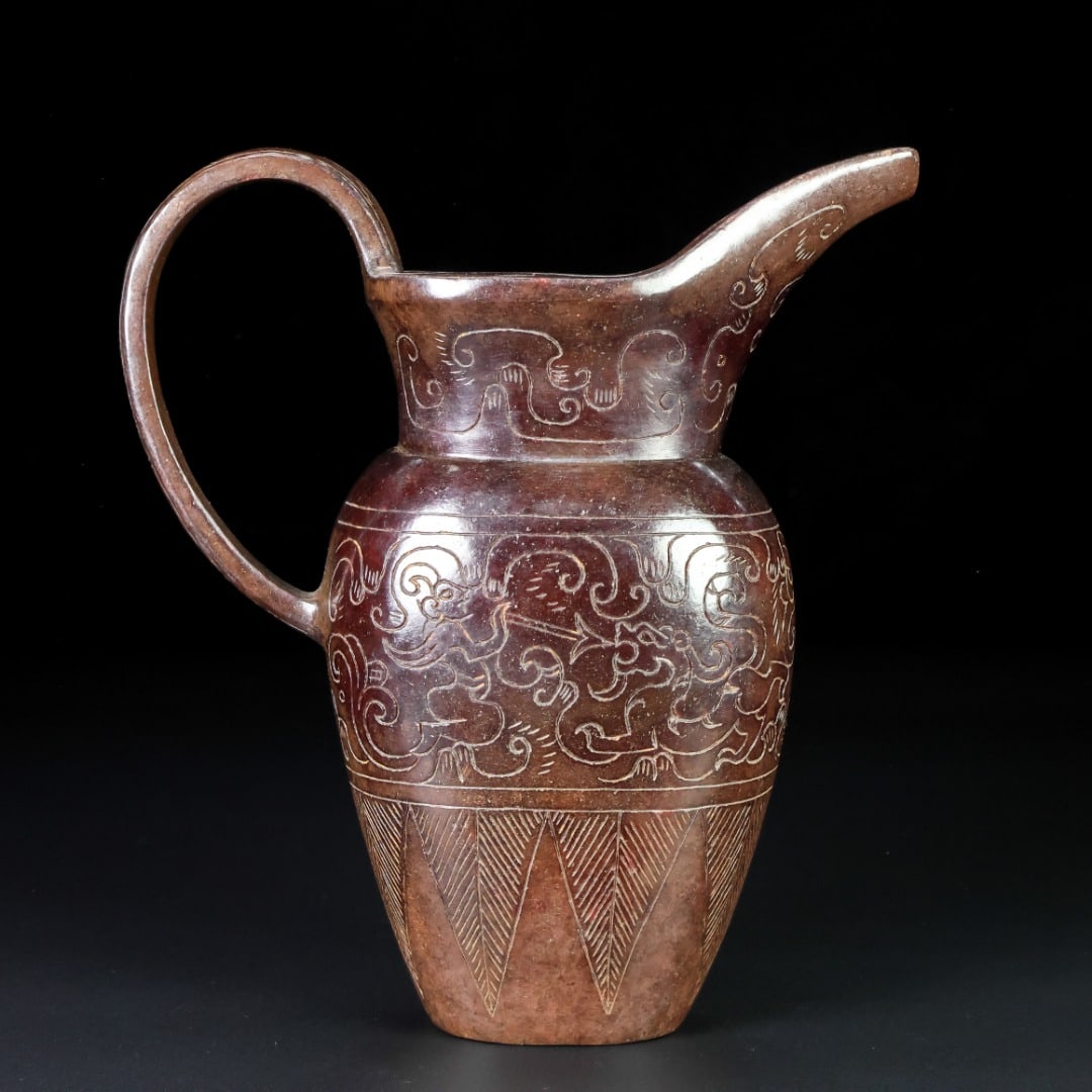An Exquisite White Jade Auspicious Beast Pattern Ewer: An Exquisite White Jade Auspicious Beast Pattern Ewer Han Dynasty, China Size:6.5inx5.9inx2.4in Weight:528g白玉瑞兽纹执壶 中国汉代 Siz