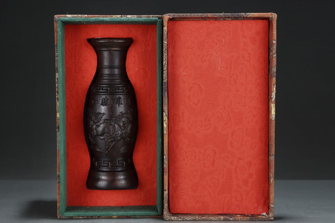 An Exquisite Eaglewood Horse Pattern Vase: An Exquisite Eaglewood Horse Pattern Vase Qing Dynasty, China Qianlong Six-character Mark Size:3.9inx10.8in沉香木八骏马瓶子 中国清