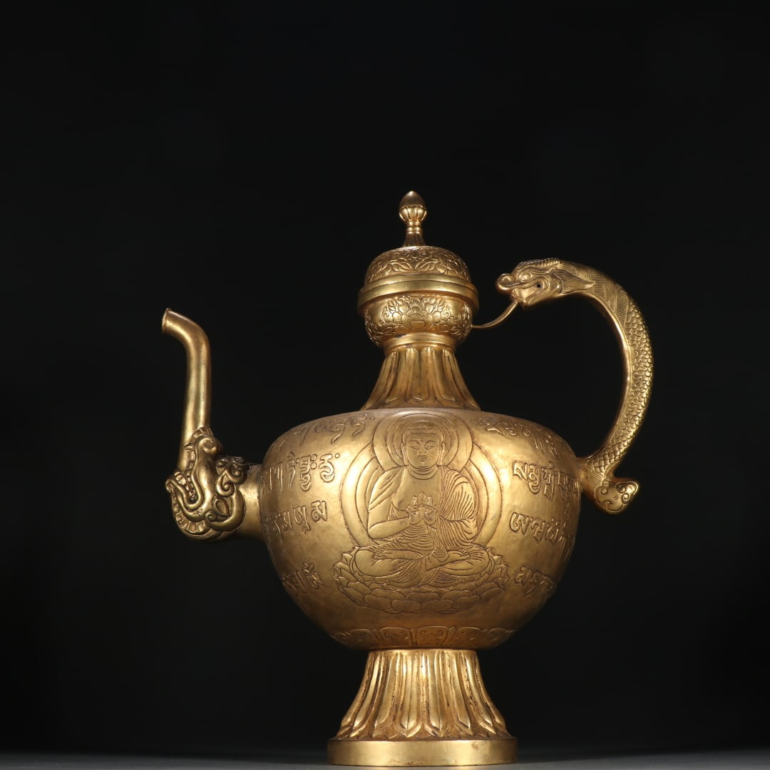 An Exquisite Gilt Bronze Buddha Statue Pattern With Sanskrit Ewer: An Exquisite Gilt Bronze Buddha Statue Pattern With Sanskrit Ewer Ming Dynasty, China Size:12.2inx10.3in Weight:1280.2g铜鎏金佛纹执壶