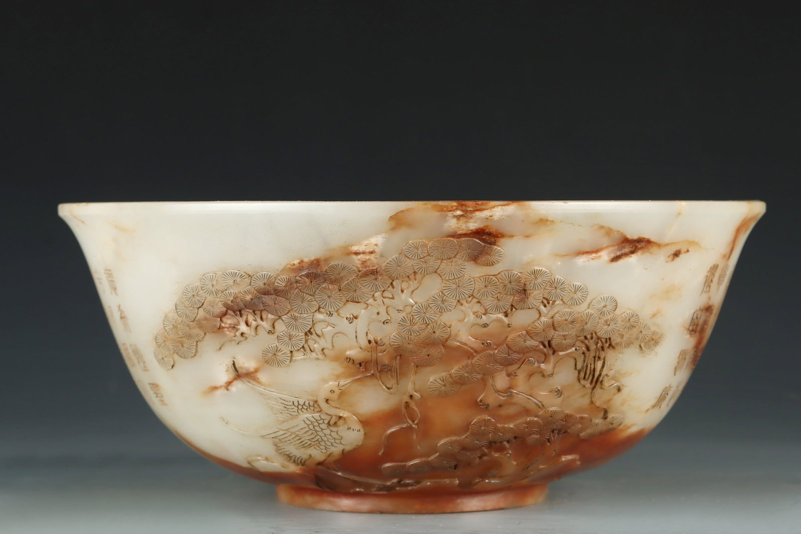 An Exquisite White Jade Pine and Crane Pattern with poem Bowl: An Exquisite White Jade Pine and Crane Pattern with poem Bowl Qing Dynasty, China Qianlong Four-character Mark Size:3.9inx9.3in Weight:1129g白玉仙鹤大碗