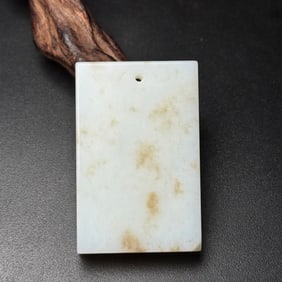 An Exquisite White Jade Pendant