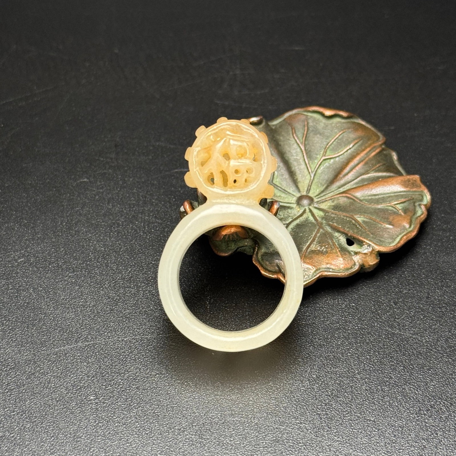 An Exquisite White Jade Hollow Ring: An Exquisite White Jade Hollow Ring,Qing Dynasty,China,Size:44mmx27mmx13mm,Weight:14g 白玉镂空戒指,中国清代