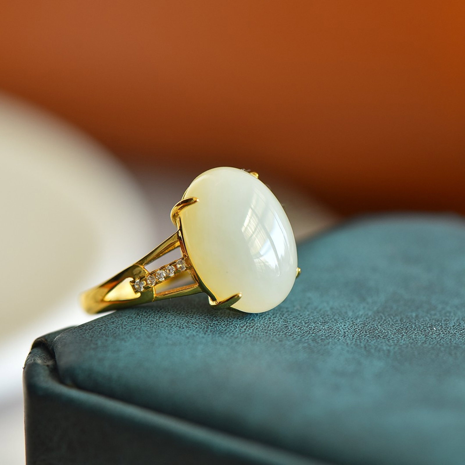 An Exquisite Sterling Silver-Gold Plated Inlaid White Jade Ring,Inlaid Diamonds: An Exquisite Sterling Silver-Gold Plated Inlaid White Jade Ring,Inlaid Diamonds,Size:12mmx16mm 纯银镀金镶白玉戒指,嵌钻石