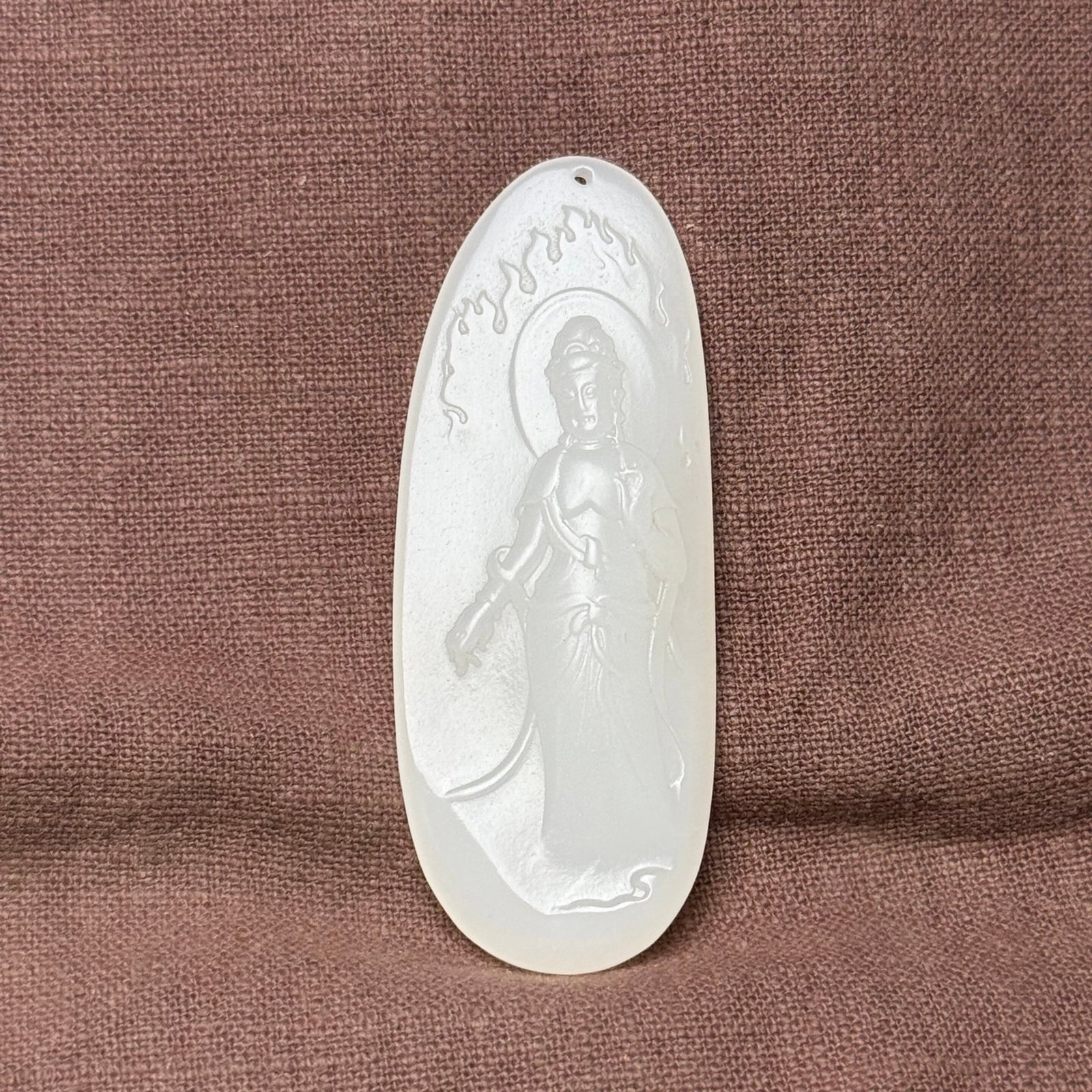 An Exquisite White Jade Statue of Avalokitesvara Pattern Pendant: An Exquisite White Jade Statue of Avalokitesvara Pattern Pendant,Qing Dynasty,China,Size:71mmx28mmx10mm,Weight:29g 白玉观音像纹挂件,中国
