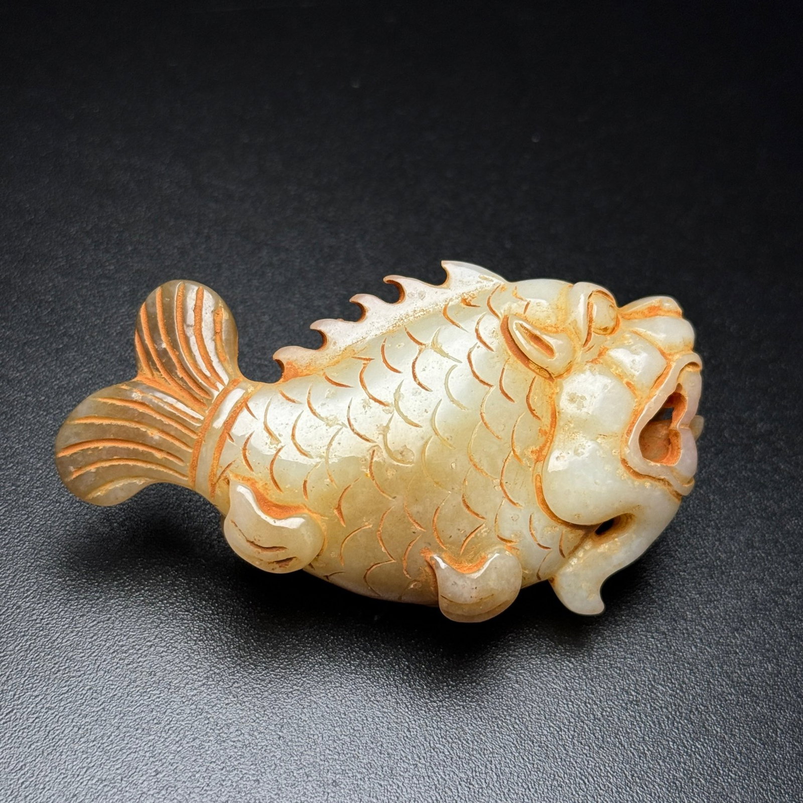 An Exquisite White Jade Fish Pendant: An Exquisite White Jade Fish Pendant,Qing Dynasty,China,Size:71mmx41mmx18mm,Weight:60g 白玉鱼挂件,中国清代
