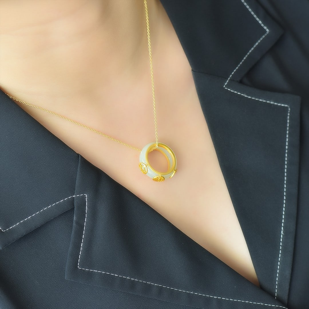 An Exquisite Sterling Silver-Gold Plated Inlaid White Jade Pendant: An Exquisite Sterling Silver-Gold Plated Inlaid White Jade Pendant 纯银镀金镶白玉吊坠