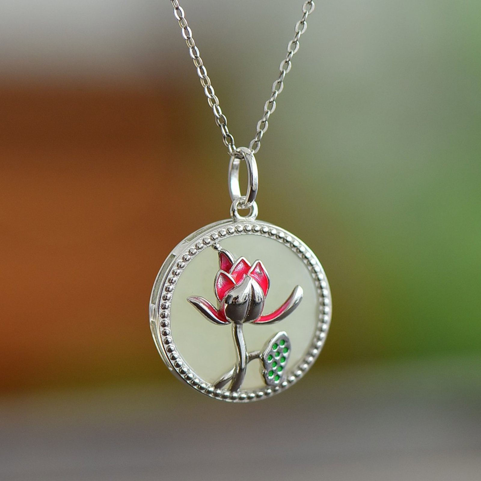 An Exquisite Sterling Silver Inlaid White Jade Pendant: An Exquisite Sterling Silver Inlaid White Jade Pendant 纯银镶白玉吊坠