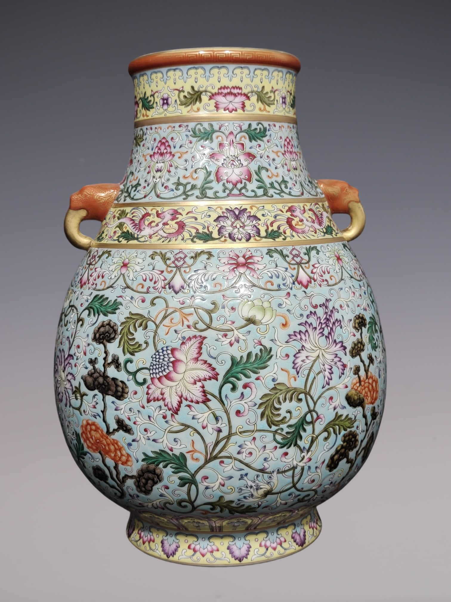 An Exquisite Famille-Rose Lotus Pattern Double-Ears Vase: An Exquisite Famille-Rose Lotus Pattern Double-Ears Vase Qing Dynasty, China Qianlong Six-character Mark Size:14.6inx10.2in粉彩缠枝莲纹双耳瓶 