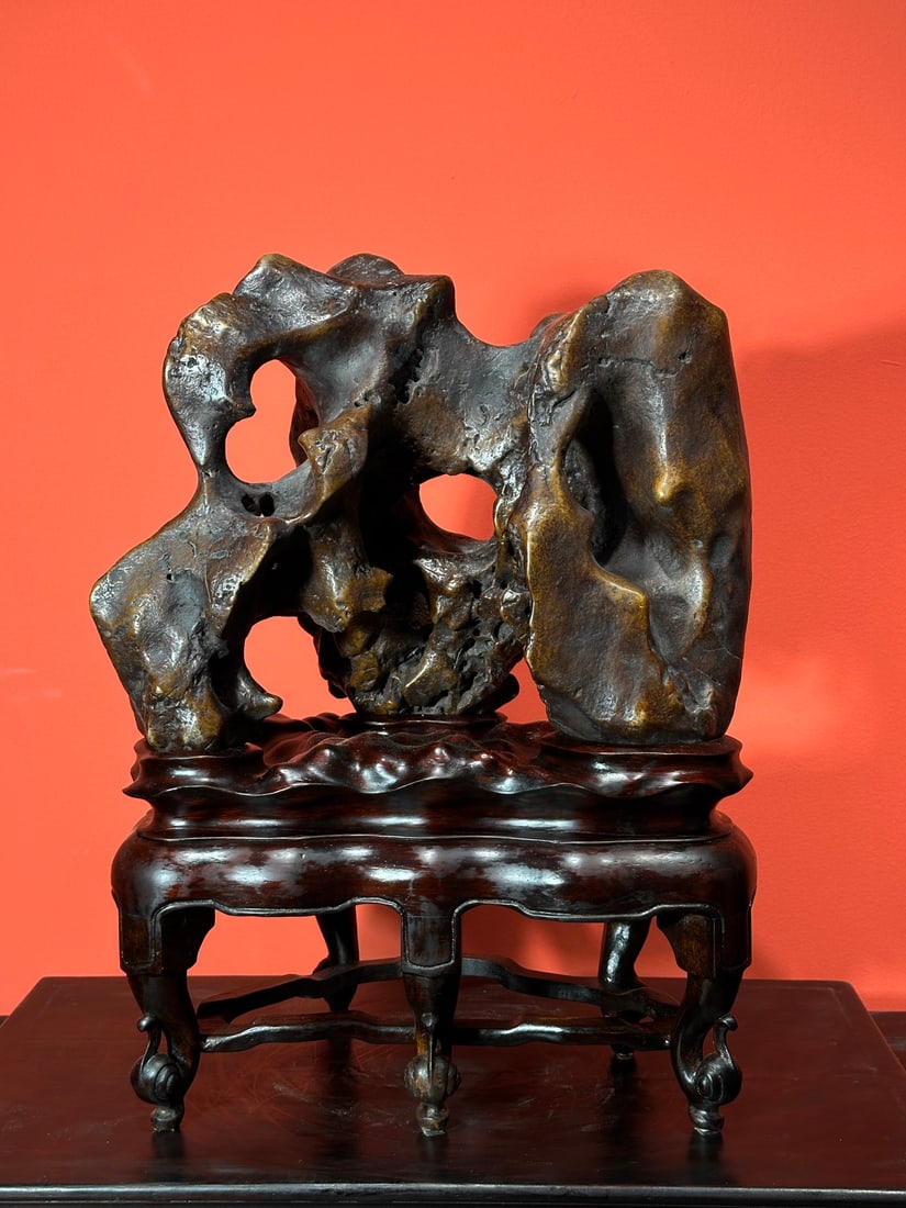 An Exquisite Taihu Stone Ornament: An Exquisite Taihu Stone Ornament Qing Dynasty, China Size:19.3inx14.2inx8.7in太湖石摆件 中国清代 Size:49cmx36cmx22cm