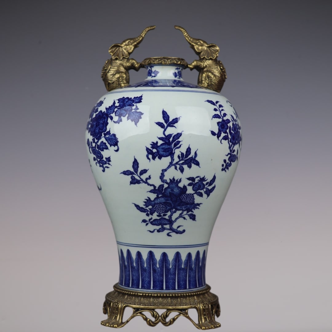 An Exquisite Blue and White Inlaid Bronze Flower and Fruit Pattern Double-Ears Vase: An Exquisite Blue and White Inlaid Bronze Flower and Fruit Pattern Double-Ears Vase Qing Dynasty, China Qianlong Six-character Mark Size:16.5inx8.3in青花折枝花果