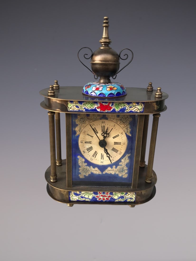 An Exquisite Bronze Lotus Pattern Clock: An Exquisite Bronze Lotus Pattern Clock Qing Dynasty, China Size:5.5inx3.1inx8.7in铜缠枝莲纹钟表 中国清代 Size:14cmx8cmx22cm