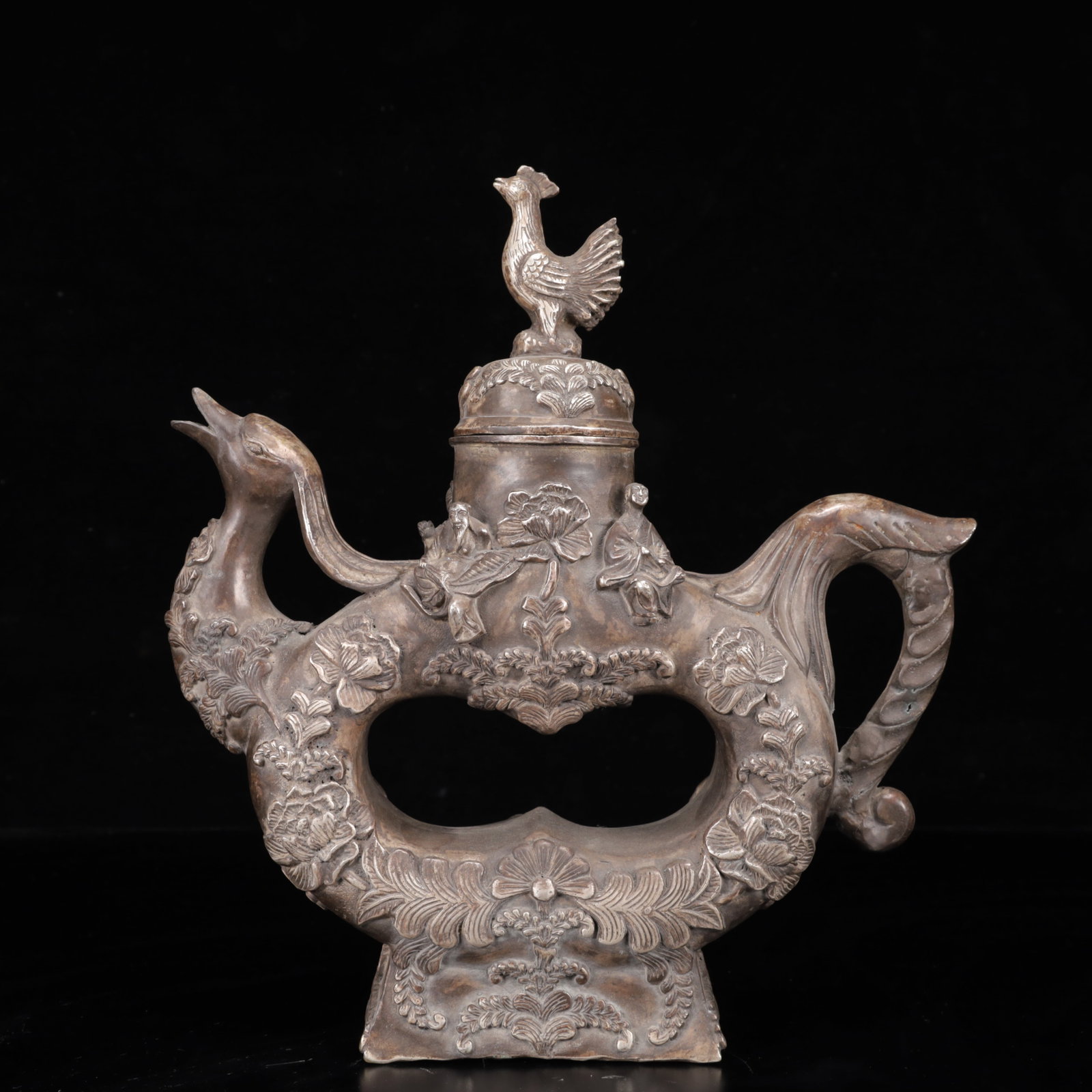 An Exquisite Silver-Plated Bronze Flower Pattern Phoenix Ornament: An Exquisite Silver-Plated Bronze Flower Pattern Phoenix Ornament,Ming Dynasty,China,Xuande Six-Character Mark,Size:10.2inx2.8inx11in,Weight:2000g 铜镀银花卉纹Ñ