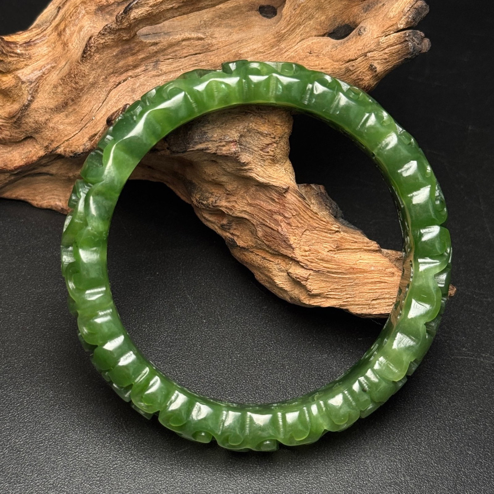 An Exquisite Jasper Hollow Flower Pattern Bracelets: An Exquisite Jasper Hollow Flower Pattern Bracelets,Qing Dynasty,China,Size:58mmx75mmx13mm,Weight:38g 碧玉镂空花卉纹手镯,中国清&
