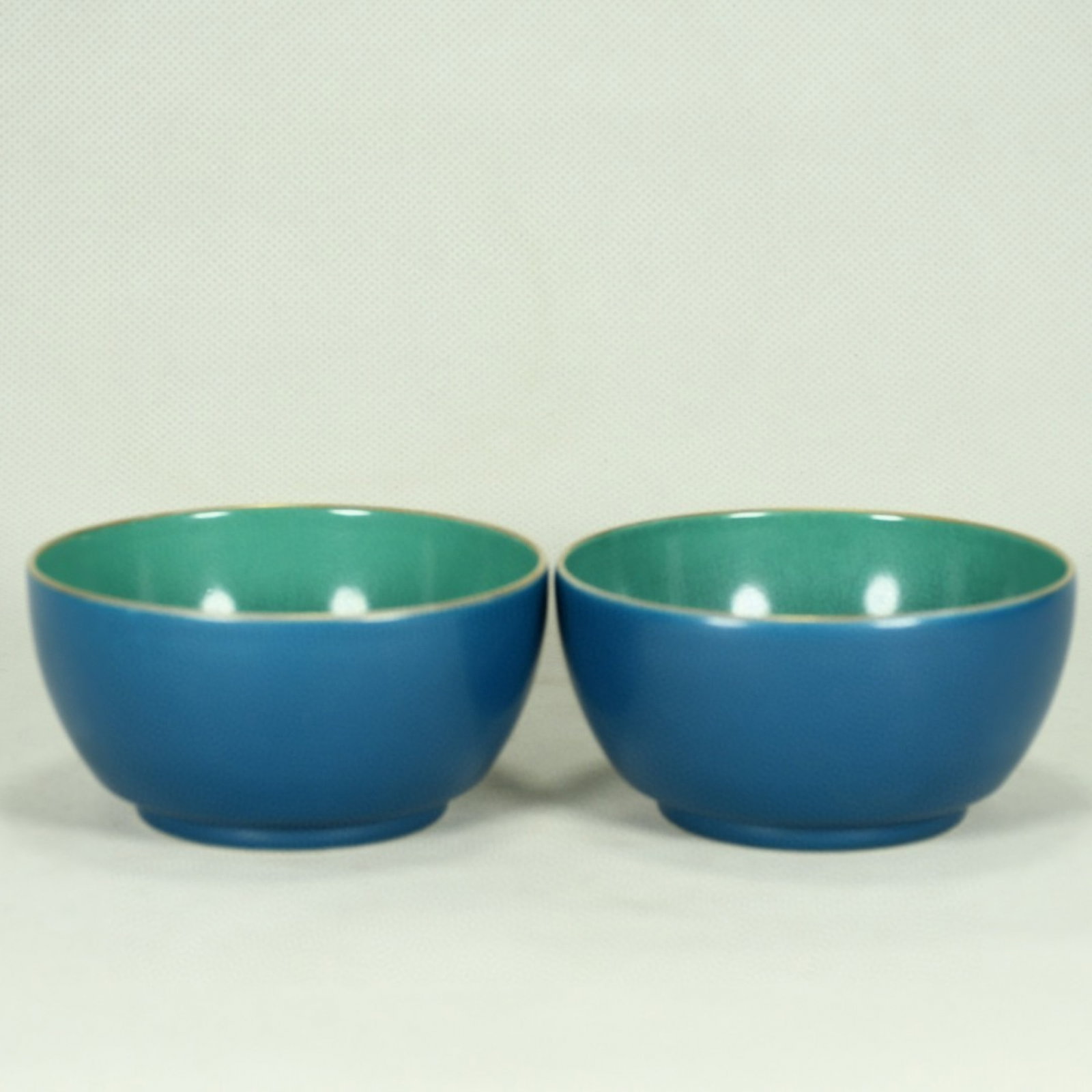 A Pair of Exquisite Blue Glazed Famille-Rose Painted Gold Seawater Figure Pattern Cups: A Pair of Exquisite Blue Glazed Famille-Rose Painted Gold Seawater Figure Pattern Cups,Qing Dynasty,China,Qianlong Six-character Mark,Size:2inx3.5in 一对蓝釉粉彩
