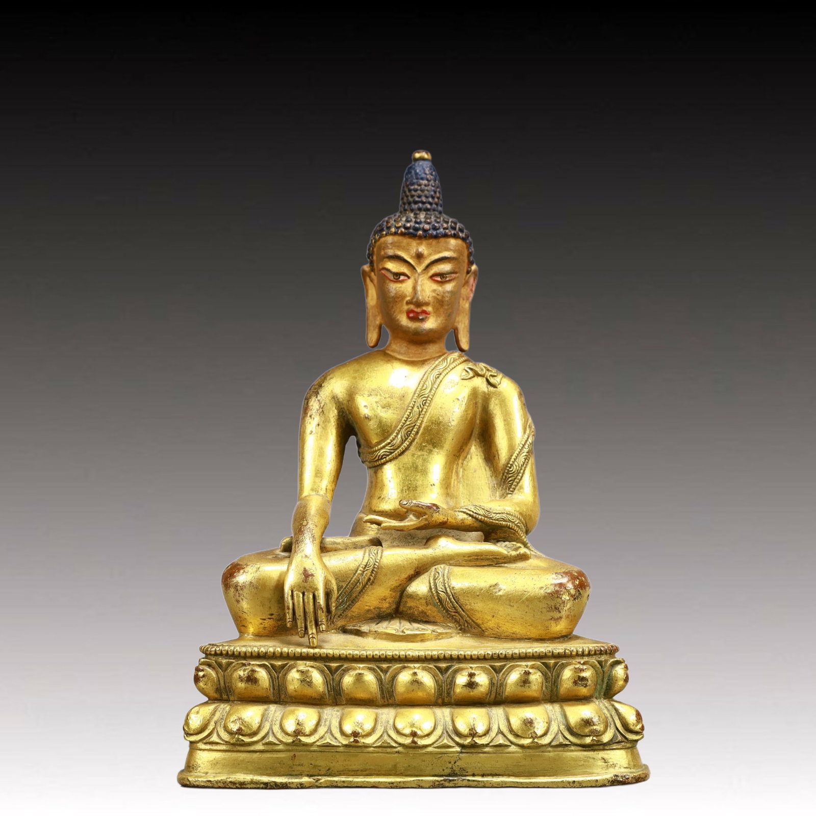 A Solemn Gilt Bronze Statue of Sakyamuni: A Solemn Gilt Bronze Statue of Sakyamuni,Qing Dynasty, China,Size:4.3inx2.4inx6.7in,Weight:550g 铜鎏金释迦摩尼像,中国清代