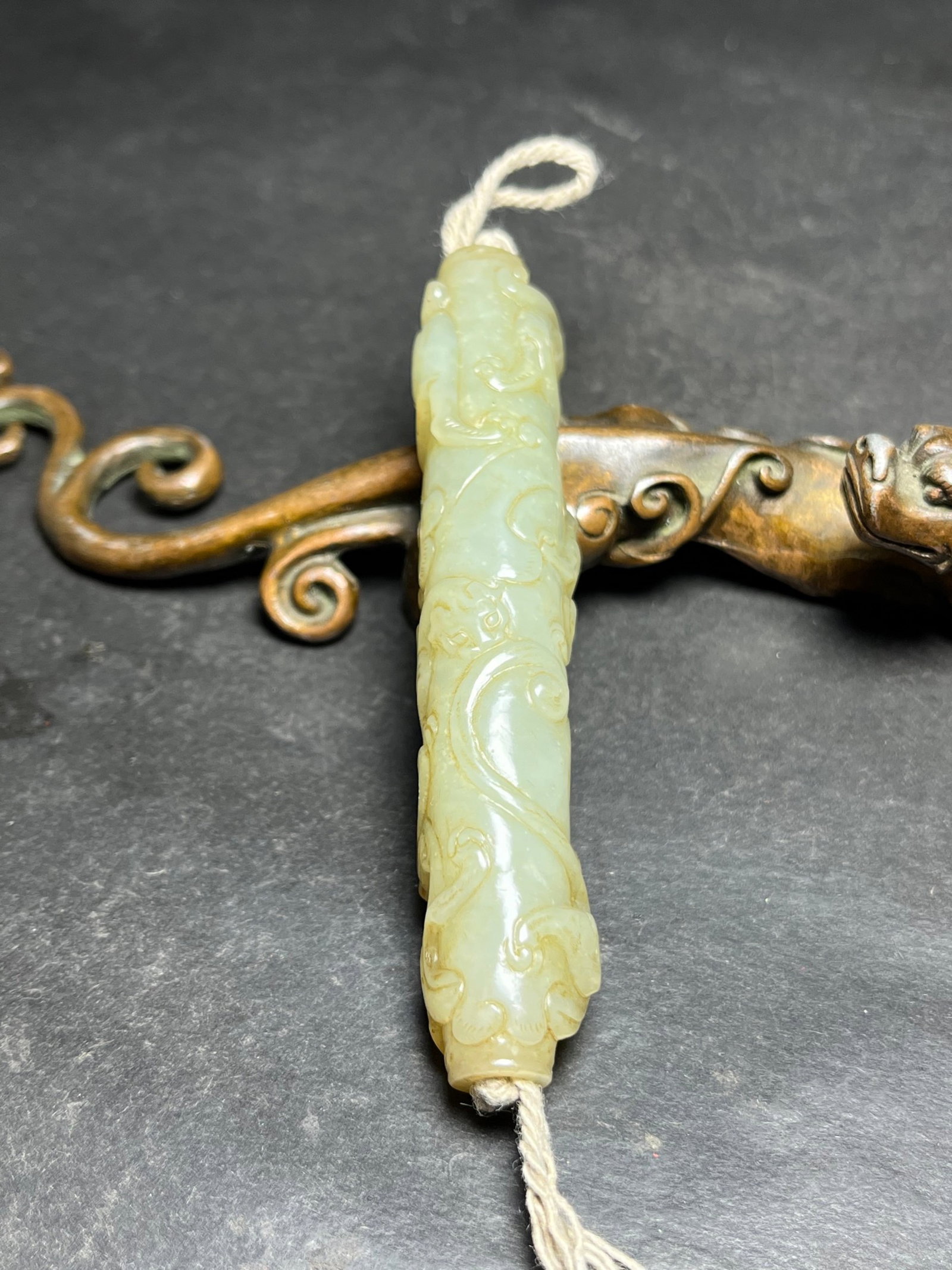 An Exquisite White Jade Dragon Pattern Pendant: An Exquisite White Jade Dragon Pattern Pendant,Qing Dynasty,China,Size:17mmx91mm,Weight:46g 白玉龙纹挂件,中国清代
