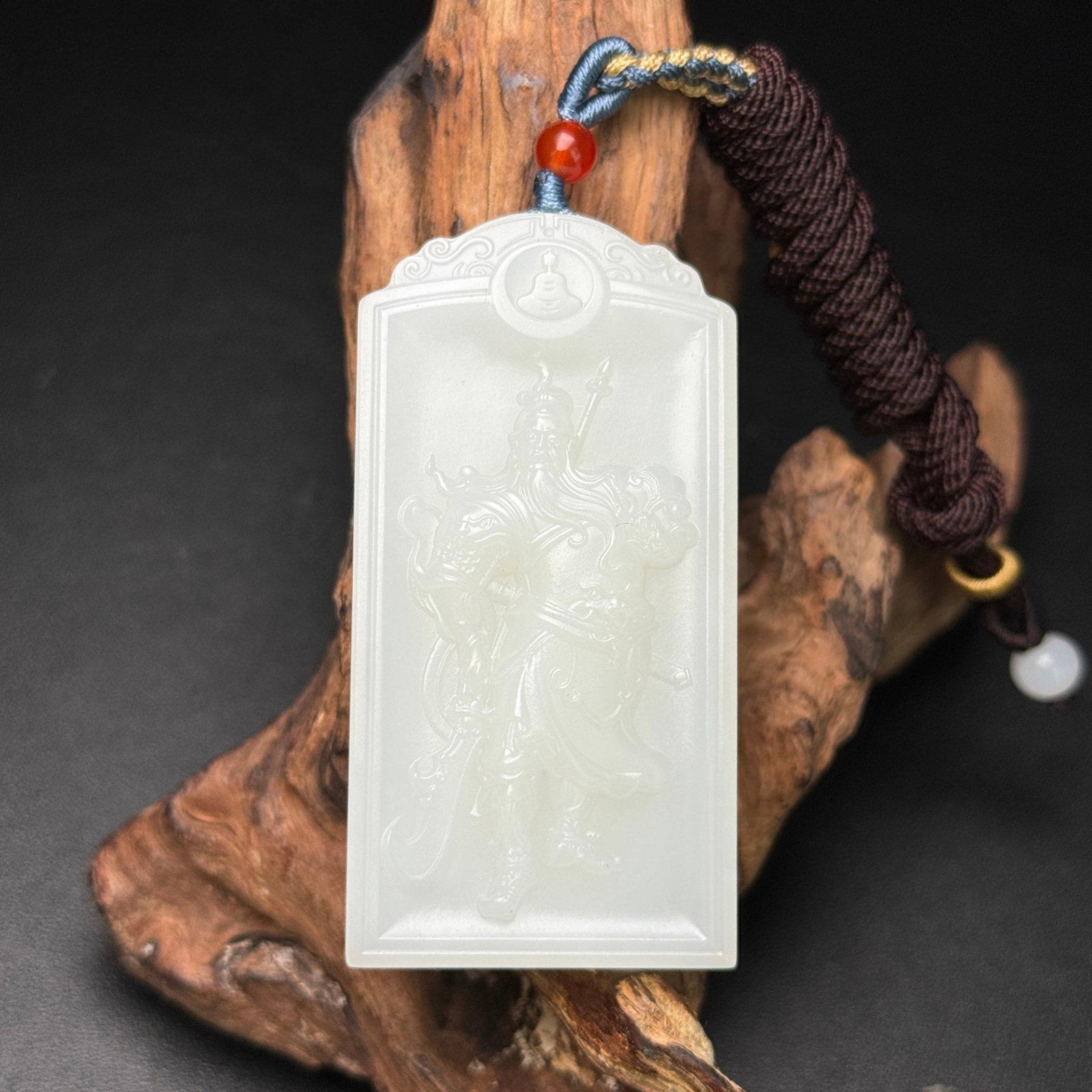 An Exquisite White Jade Statue of Guangong Pattern Pendant: An Exquisite White Jade Statue of Guangong Pattern Pendant,Qing Dynasty,China,Size:62mmx32mmx12mm,Weight:56g 白玉关公像纹挂件,中国清&#