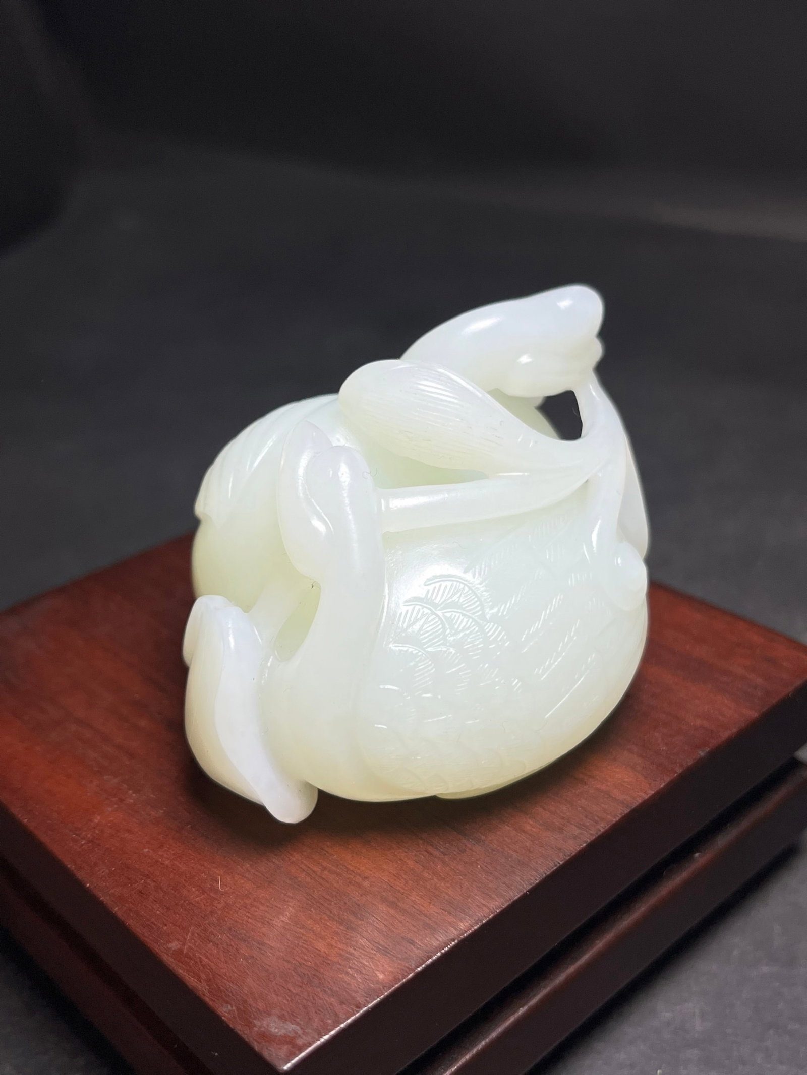 An Exquisite White Jade Goose Hand Piece: An Exquisite White Jade Goose Hand Piece,Qing Dynasty,China,Size:49mmx41mmx58mm,Weight:138g 白玉鹅手把件,中国清代