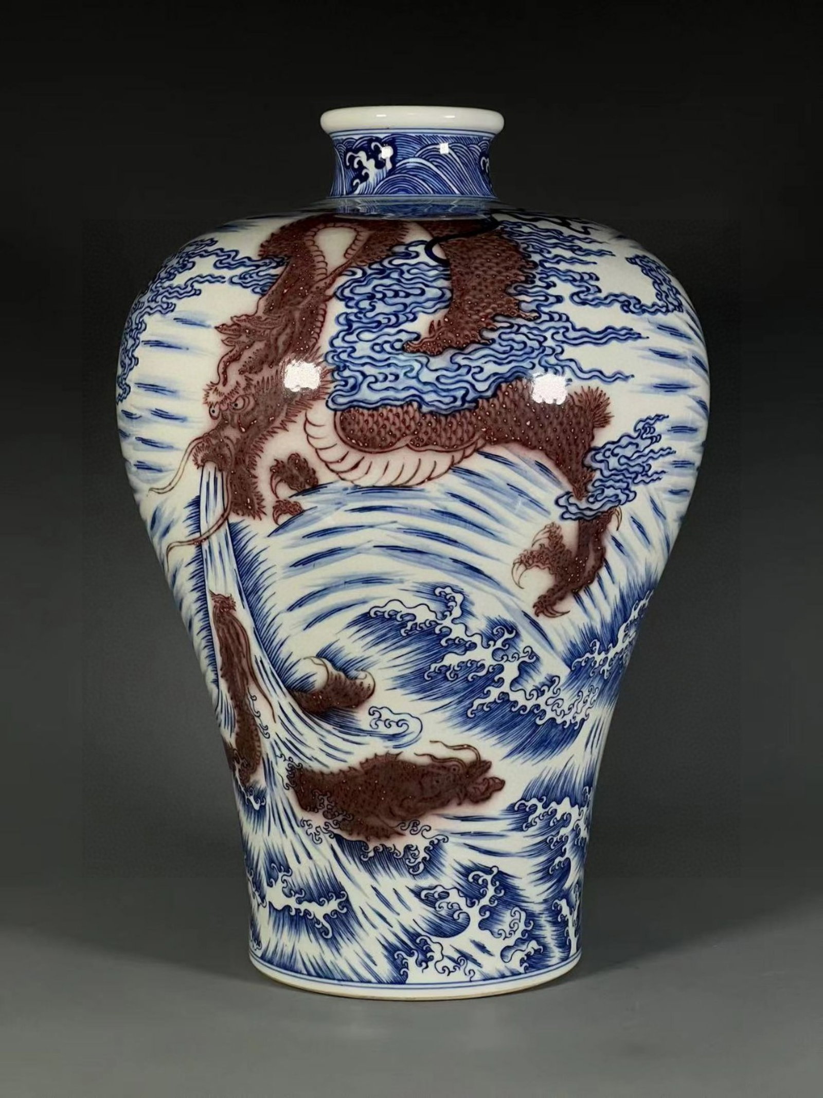 An Exquisite Blue and White Underglaze-Red Seawater,Auspicious Cloud and Dragon Pattern Vase: An Exquisite Blue and White Underglaze-Red Seawater,Auspicious Cloud and Dragon Pattern Vase,Qing Dynasty,China,Yongzheng Six-character Mark,Size:14.1inx3inx5.6in 青花釉里ń