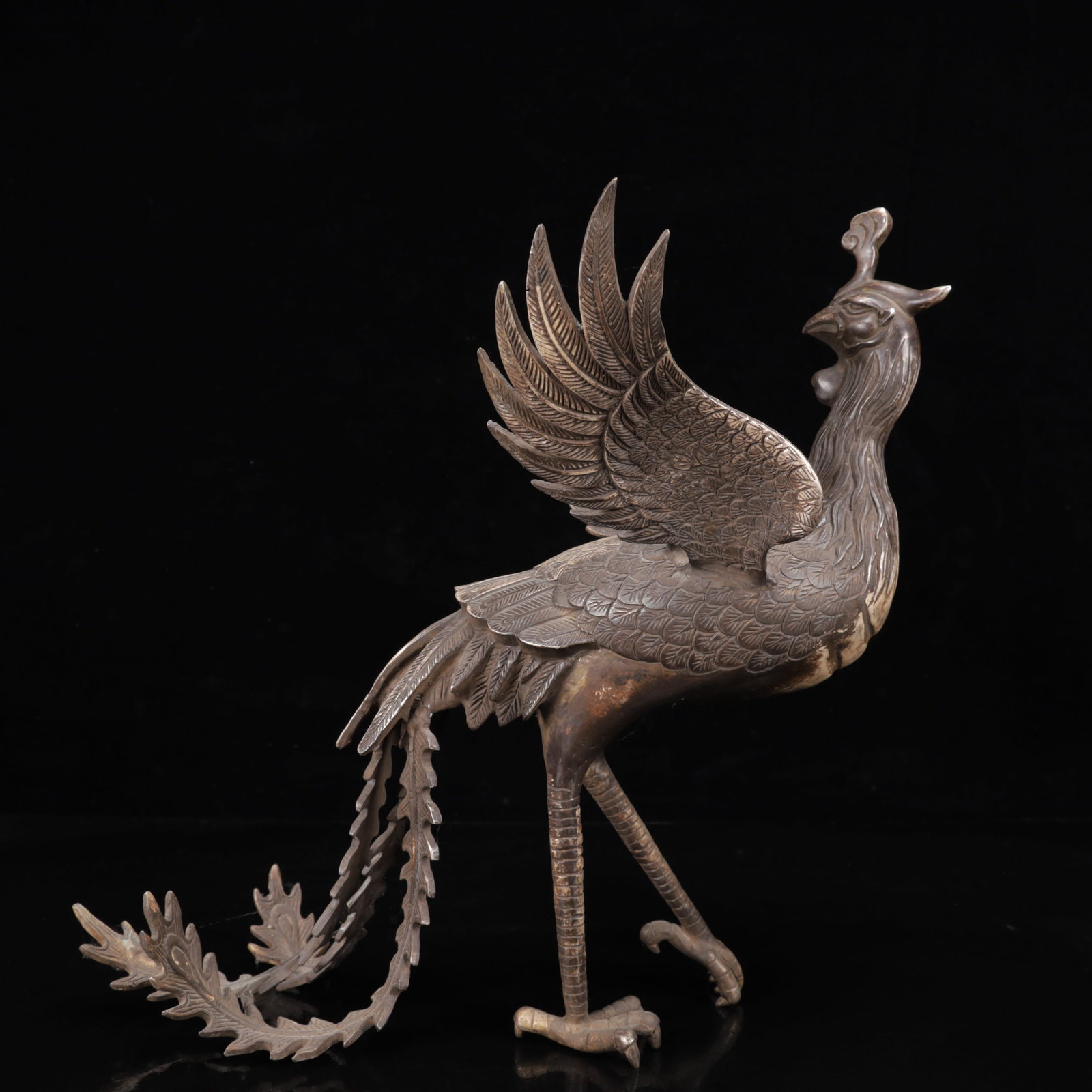 An Exquisite Silver-Plated Bronze Phoenix Ornament: An Exquisite Silver-Plated Bronze Phoenix Ornament,Qing Dynasty,China,Size:13inx11.8inx14.2in,Weight:3500g 铜镀银凤摆件,中国清代