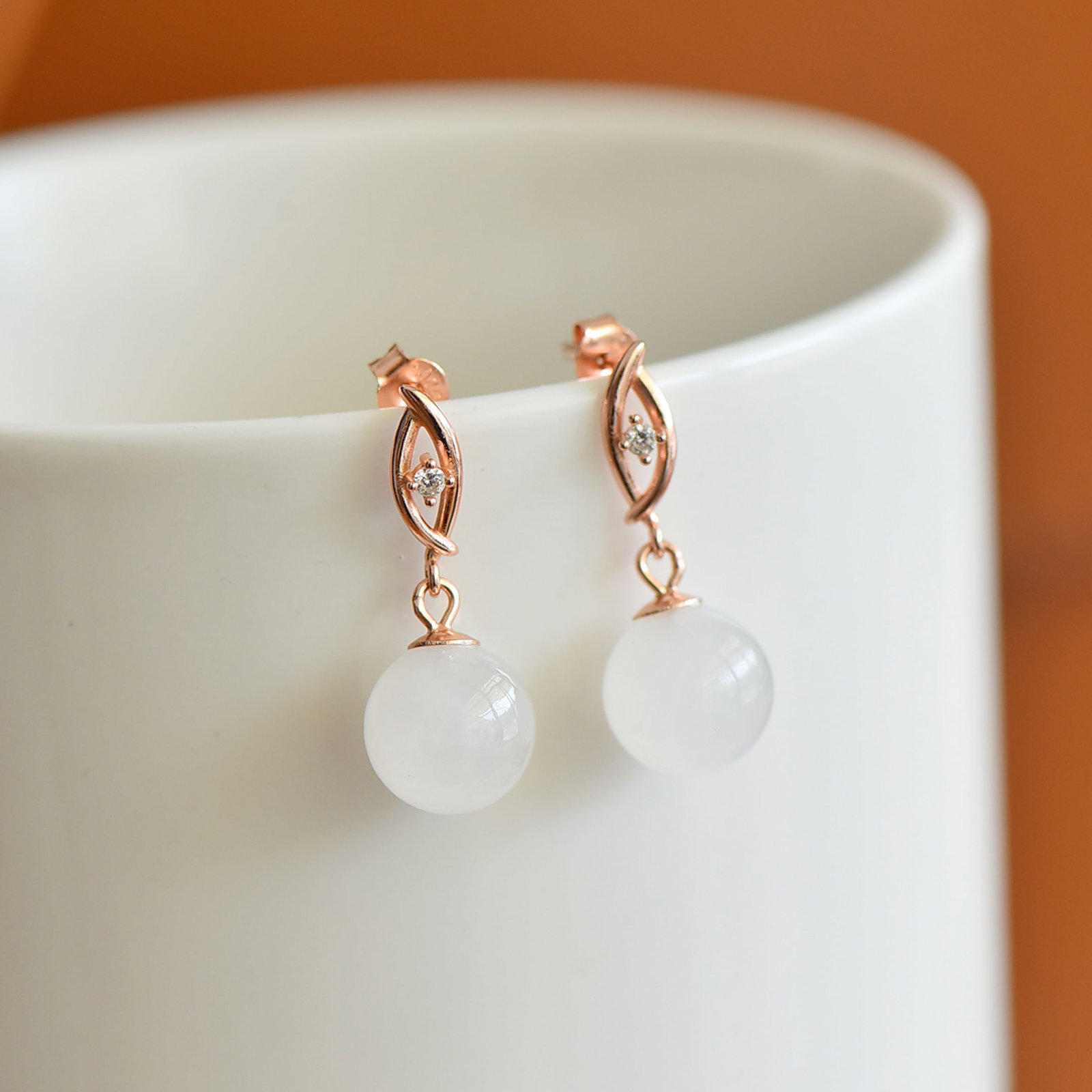 A Pair of Exquisite Sterling Silver-Gold Plated Inlaid White Jade Earrings: A Pair of Exquisite Sterling Silver-Gold Plated Inlaid White Jade Earrings,Size:10mmx10mm 一对纯银镀金镶白玉耳环