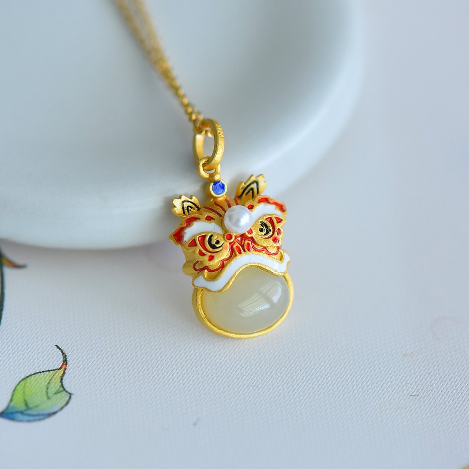 An Exquisite Sterling Silver-Gold Plated Inlaid White Jade Pendant: An Exquisite Sterling Silver-Gold Plated Inlaid White Jade Pendant 纯银镀金镶白玉吊坠