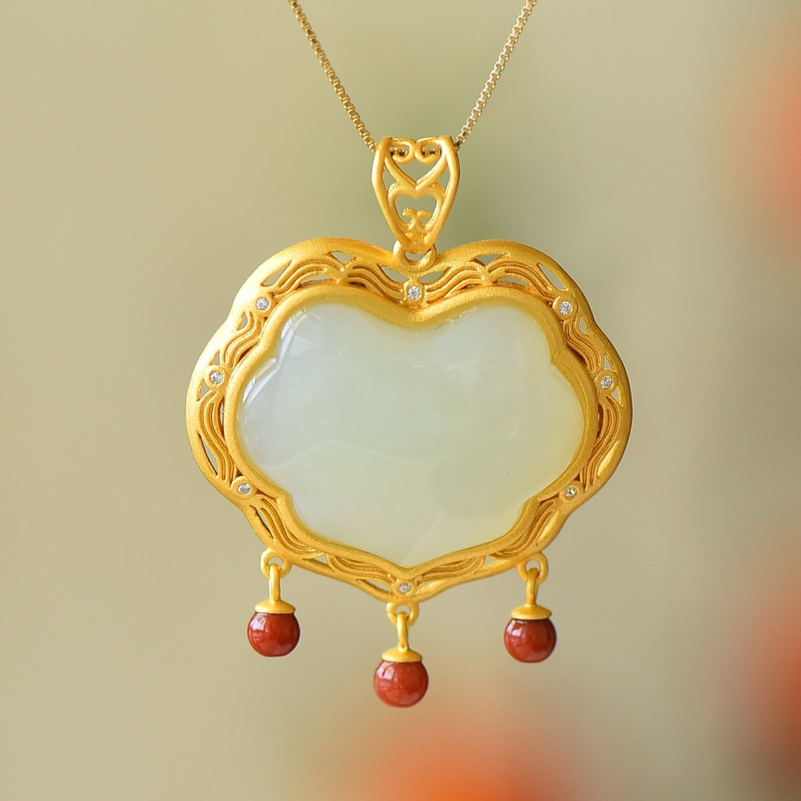 An Exquisite Sterling Silver-Gold Plated Inlaid White Jade Pendant: An Exquisite Sterling Silver-Gold Plated Inlaid White Jade Pendant 纯银镀金镶白玉吊坠
