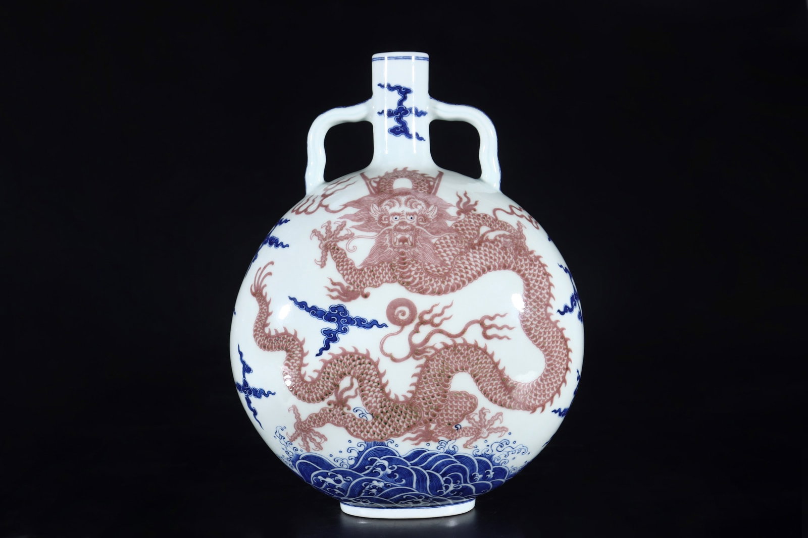 A Rare Blue and White Underglaze-Red Auspicious Cloud and Dragon Pattern Double-Ears Vase: A Rare Blue and White Underglaze-Red Auspicious Cloud and Dragon Pattern Double-Ears Vase,Qing Dynasty,China,Qianlong Six-character Mark,Size:12.2inx9.4in 青花釉里红Ķ