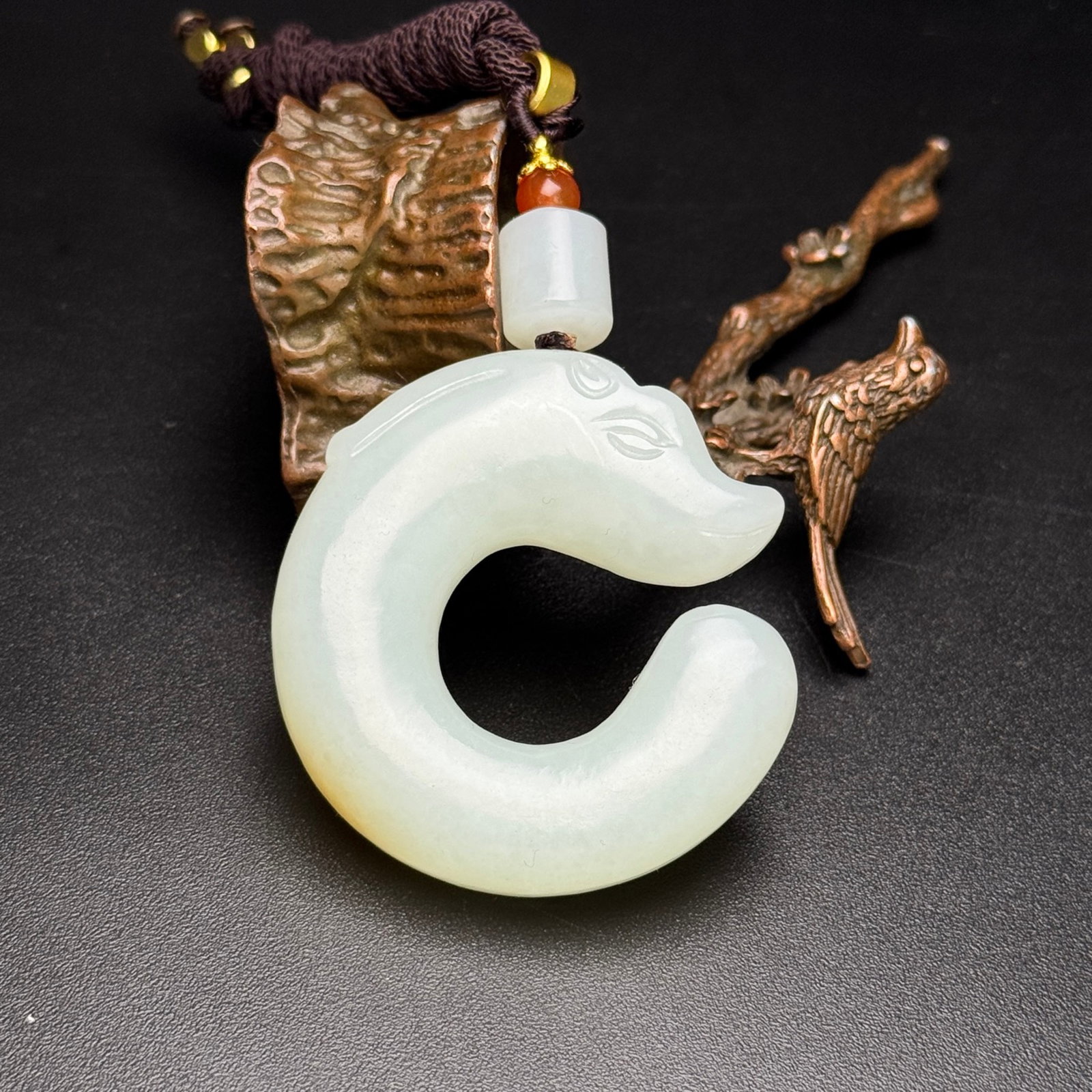 An Exquisite White Jade Pig and Dragon Pendant: An Exquisite White Jade Pig and Dragon Pendant,Qing Dynasty,China,Size:2inx2inx0.5in,Weight:53g 白玉猪龙挂件,中国清代