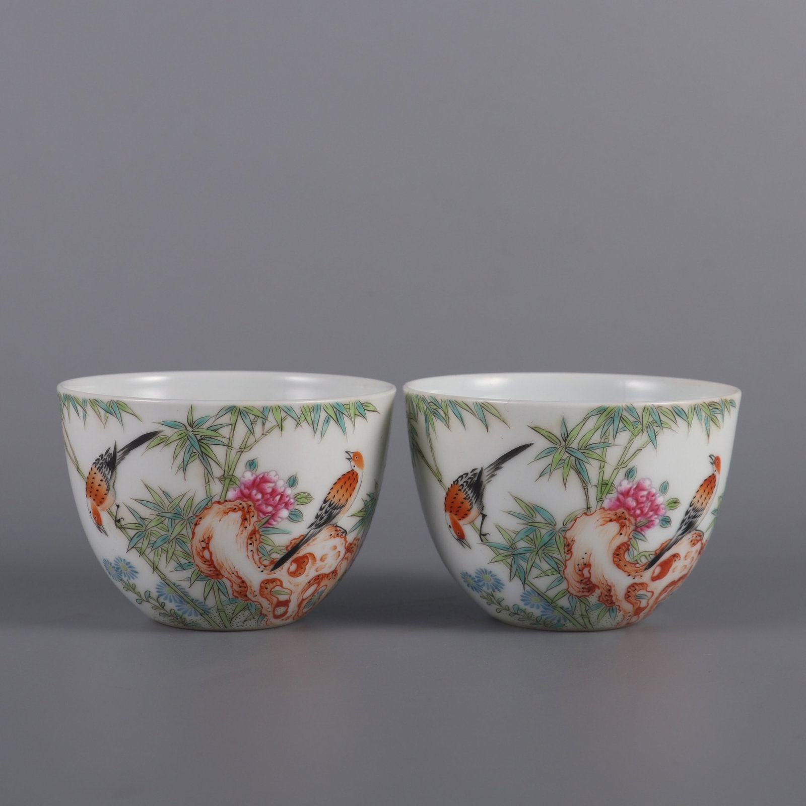 A Pair of Exquisite Famille-Rose Flower and Bird Pattern Cups, with poem: A Pair of Exquisite Famille-Rose Flower and Bird Pattern Cups,with poem,Qing Dynasty,China,Yongzheng Four-character Mark,Size:2inx2.8in 一对粉彩花鸟纹杯