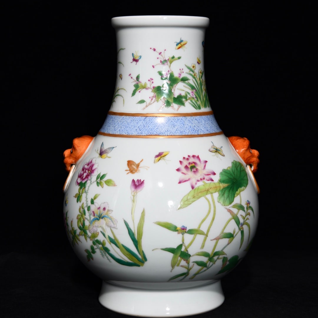 An Exquisite Famille-Rose Flower and Butterfly Pattern Beast-Ears Vase: An Exquisite Famille-Rose Flower and Butterfly Pattern Beast-Ears Vase,Qing Dynasty,China,Yongzheng Six-Character Mark,Size:11.3inx7.5in 粉彩花卉蝴蝶纹兽