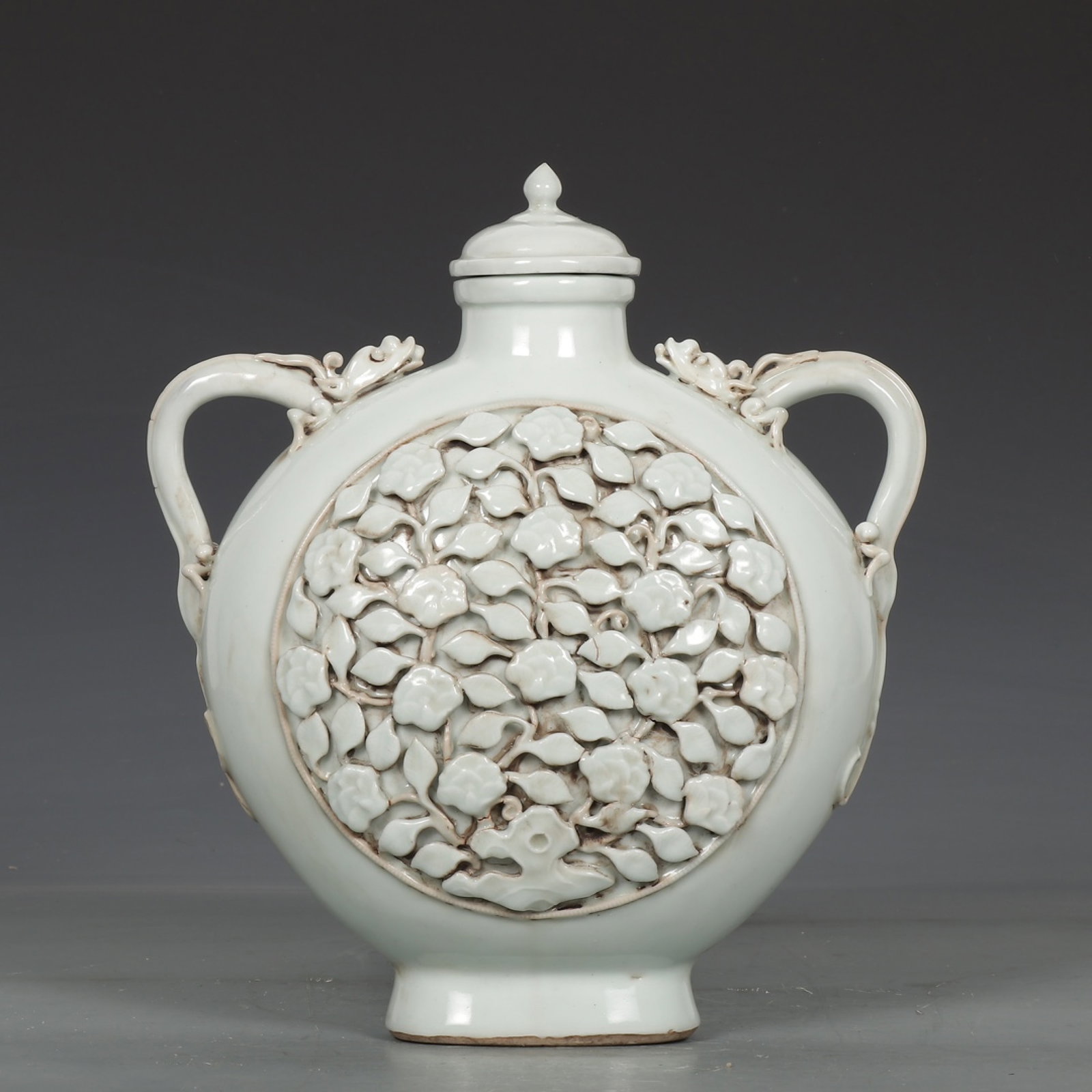 An Exquisite White Glazed Flower Pattern Pot (1 of 9)