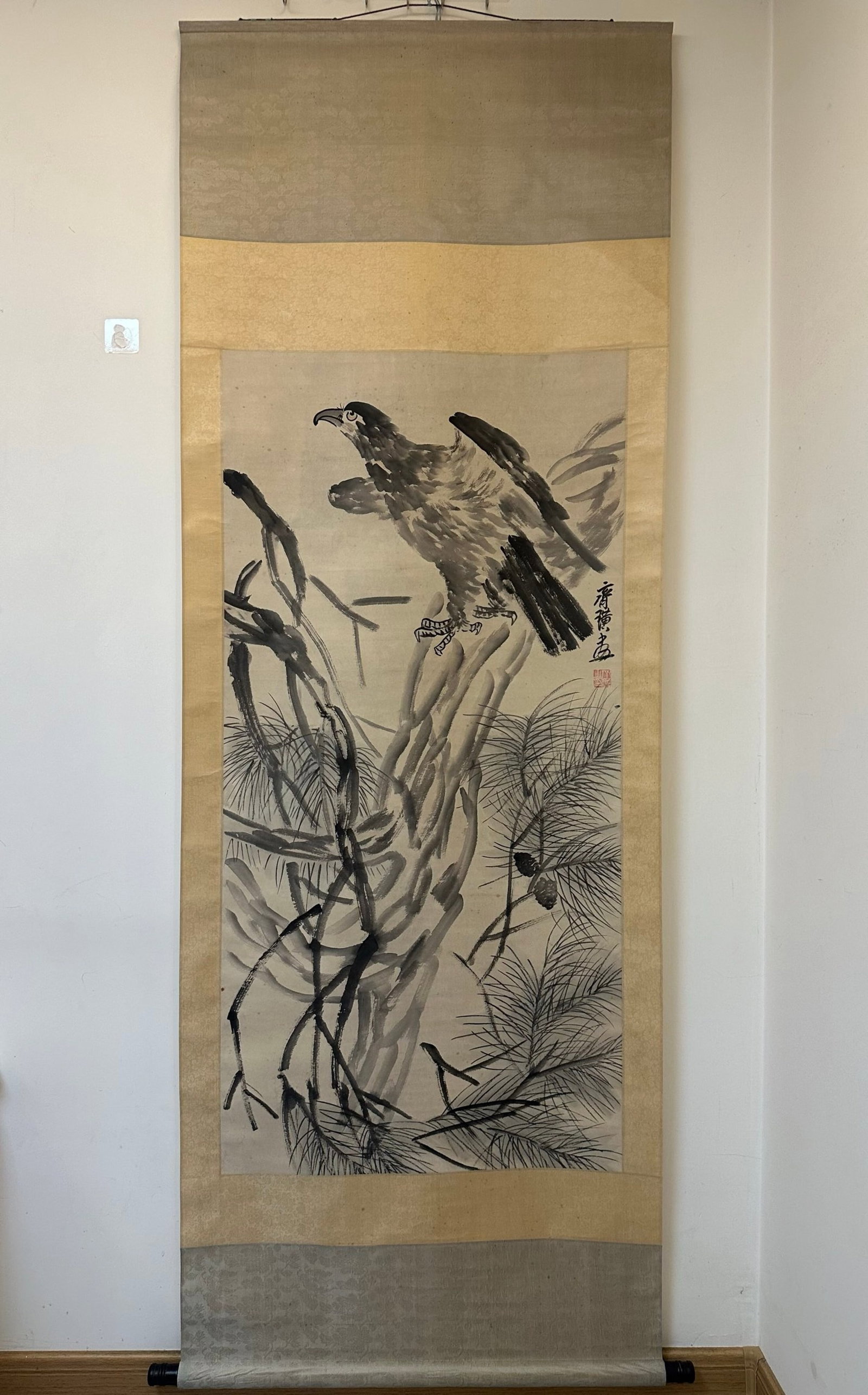 A Chinese Vertical Scroll Ink Painting of Pine and Eagle on Paper: A Chinese Vertical Scroll Ink Painting of Pine and Eagle on Paper,Qi Baishi,Size:26inx52.8in 一幅中国水墨松鹰画立轴,齐白&#