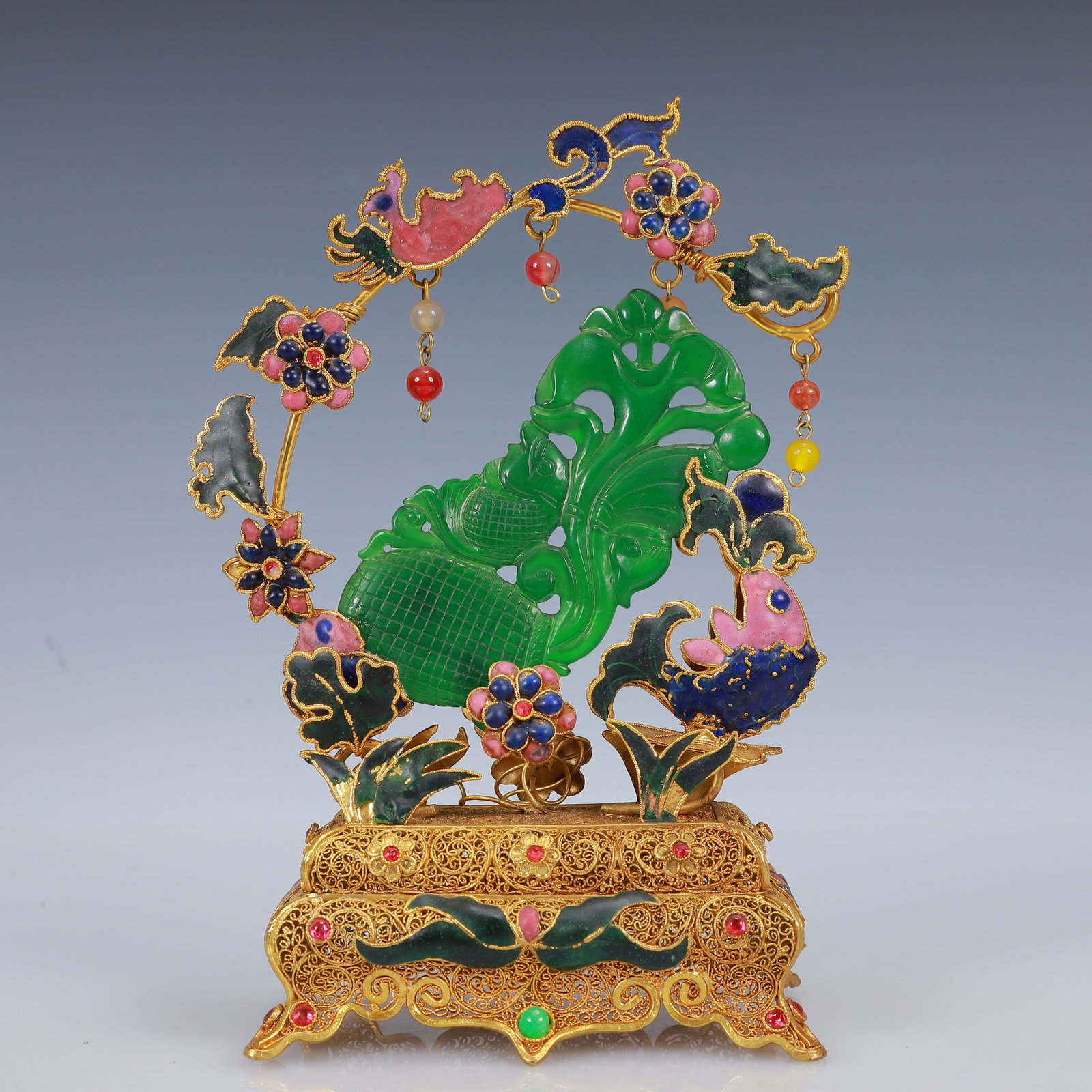 An Exquisite Filigree and Gilding Inlaid Jadeite Flower Ornament,Inlaid Gems: An Exquisite Filigree and Gilding Inlaid Jadeite Flower Ornament,Inlaid Gems,Qing Dynasty, China,Qianlong Four-Character Mark,Size:4.7inx2.8inx8.3in,Weight:323g 花丝鎏金嵌