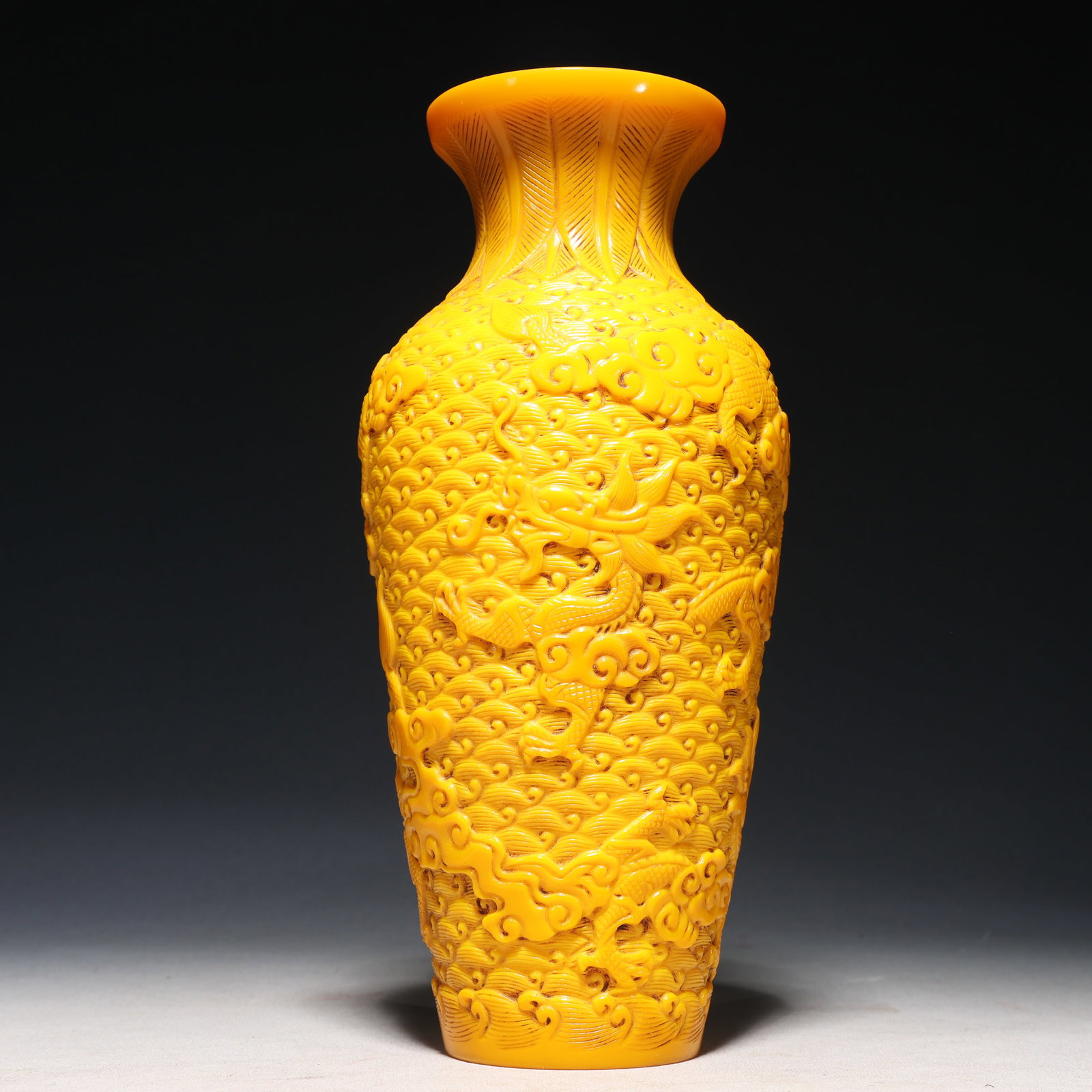 An Exquisite Glass Seawater Dragon Pattern Vase: An Exquisite Glass Seawater Dragon Pattern Vase,Qing Dynasty,China,Qianlong Four-character Mark,Size:4.7inx10.6in 琉璃海水龙纹瓶,中国清É
