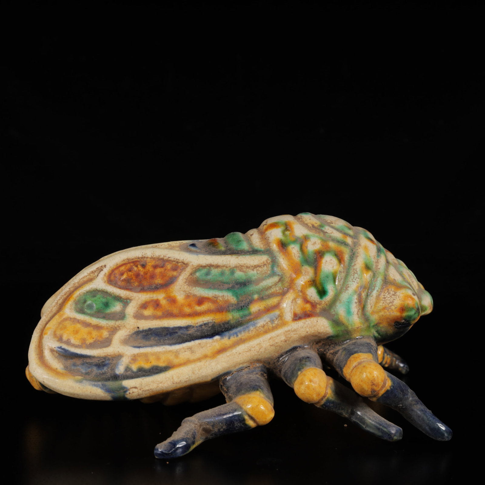 An Exquisite Tang Tri-Color Glazed Pottery Cicada Ornament: An Exquisite Tang Tri-Color Glazed Pottery Cicada Ornament,Tang Dynasty,China,Size:6.3inx4.3inx3.1in,Weight:400g 唐三彩蝉摆件,中国唐代