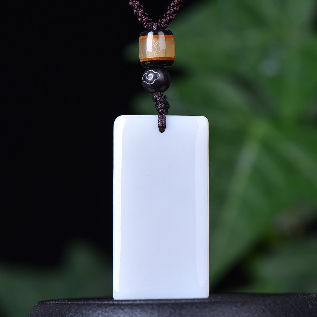 An Exquisite White Jade Pendant: An Exquisite White Jade Pendant,Size:0.8inx1.6in 白玉挂件