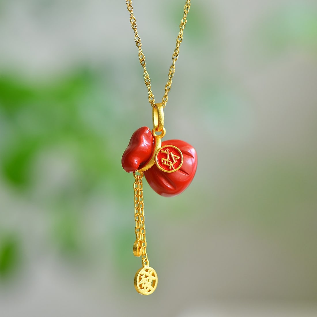 An Exquisite Sterling Silver-Gold Plated Inlaid Cinnabar Pendant: An Exquisite Sterling Silver-Gold Plated Inlaid Cinnabar Pendant,Size:0.5inx0.7in 寓意:招财进宝