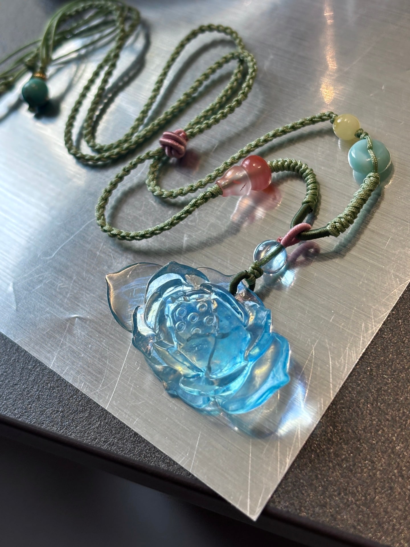 An Exquisite Aquamarine Peony Pendant: An Exquisite Aquamarine Peony Pendant,Size:1.5inx0.8inx0.4in,Weight:8.9g 海蓝宝牡丹挂件
