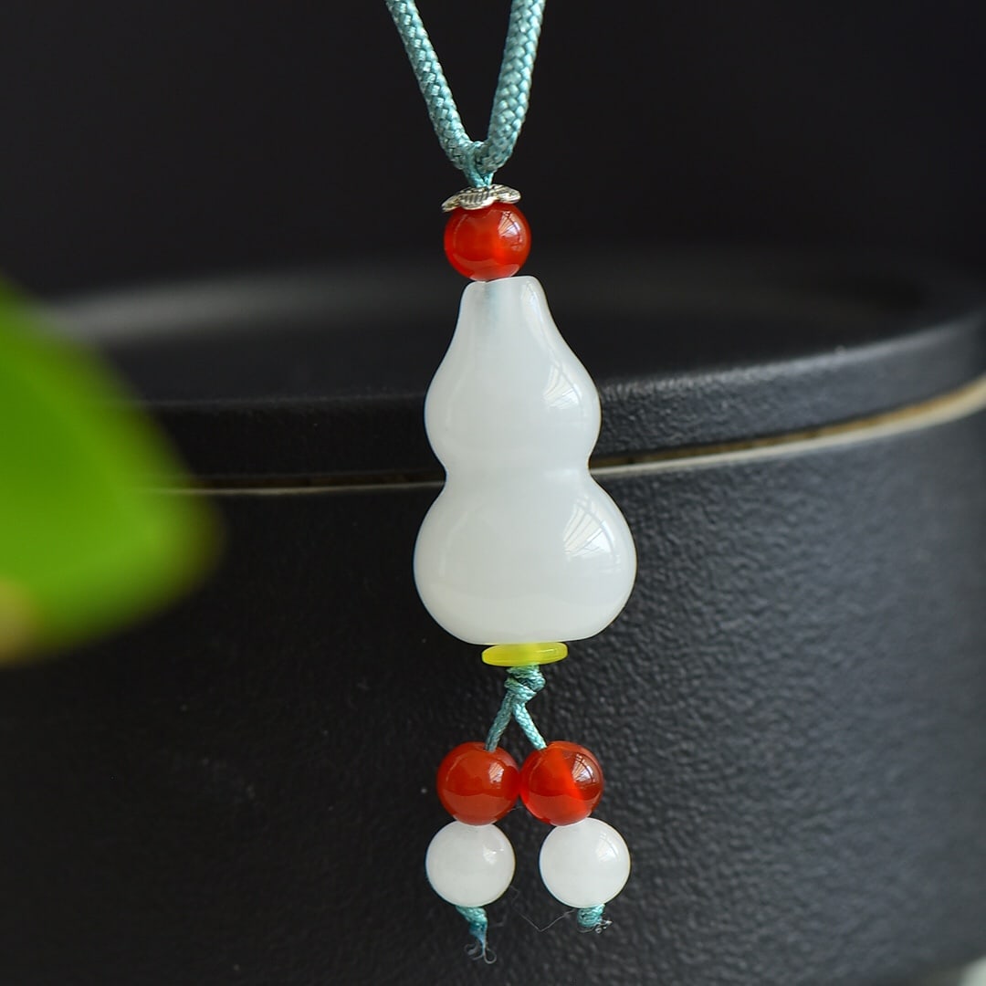 An Exquisite White Jade Pendant: An Exquisite White Jade Pendant,Size:1inx0.6in 白玉挂件