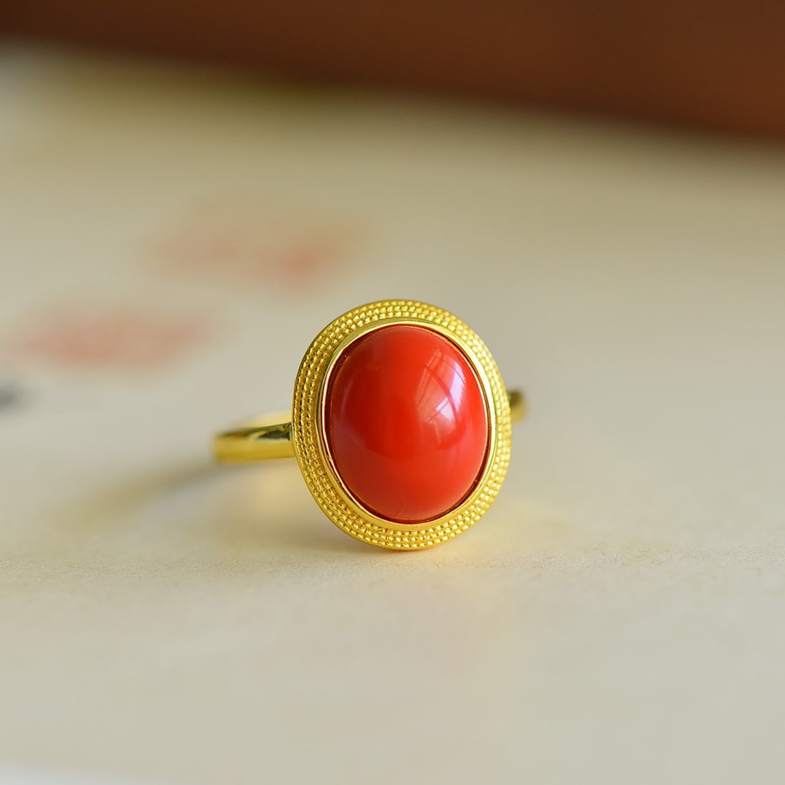 An Exquisite Sterling Silver-Gold Plated Inlaid Cinnabar Ring: An Exquisite Sterling Silver-Gold Plated Inlaid Cinnabar Ring,Size:0.4inx0.5in 寓意:圆圆满满 纯银镀金镶朱砂戒指