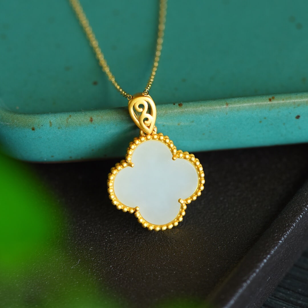 An Exquisite Sterling Silver-Gold Plated Inlaid White Jade Pendant: An Exquisite Sterling Silver-Gold Plated Inlaid White Jade Pendant 纯银镀金镶白玉吊坠