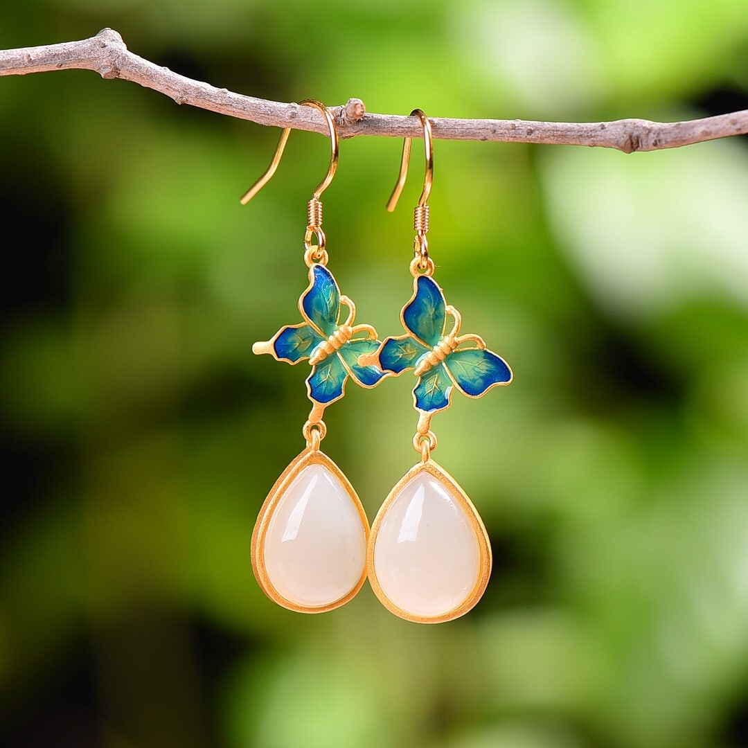 A Pair of Exquisite Sterling Silver Inlaid White Jade Butterfly Pattern Earrings: A Pair of Exquisite Sterling Silver Inlaid White Jade Butterfly Pattern Earrings,Size:0.4inx0.6in 一对纯银镶白玉蝴蝶纹耳环