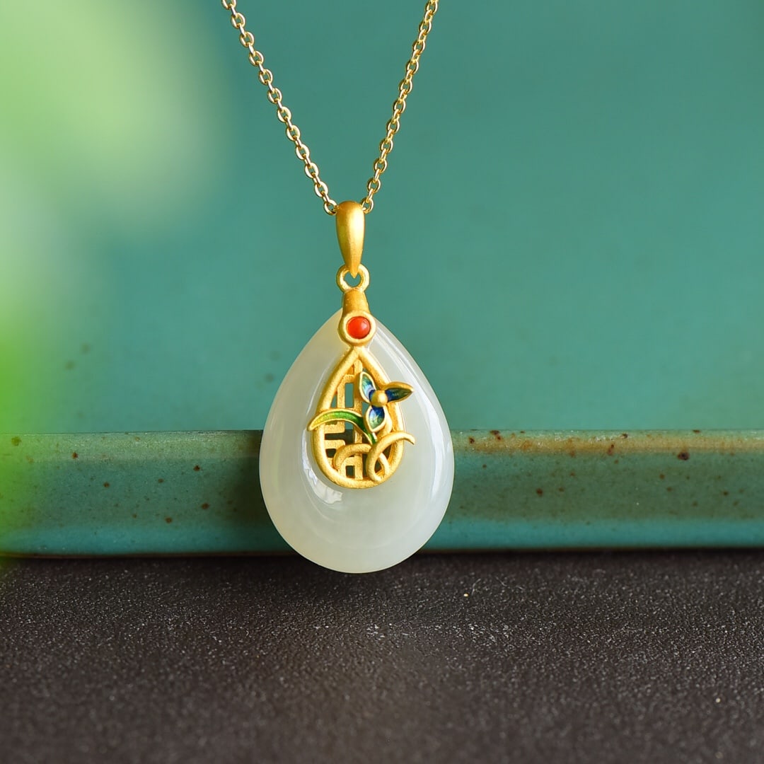 An Exquisite Sterling Silver-Gold Plated Inlaid White Jade Pendant: An Exquisite Sterling Silver-Gold Plated Inlaid White Jade Pendant 纯银镀金镶白玉吊坠