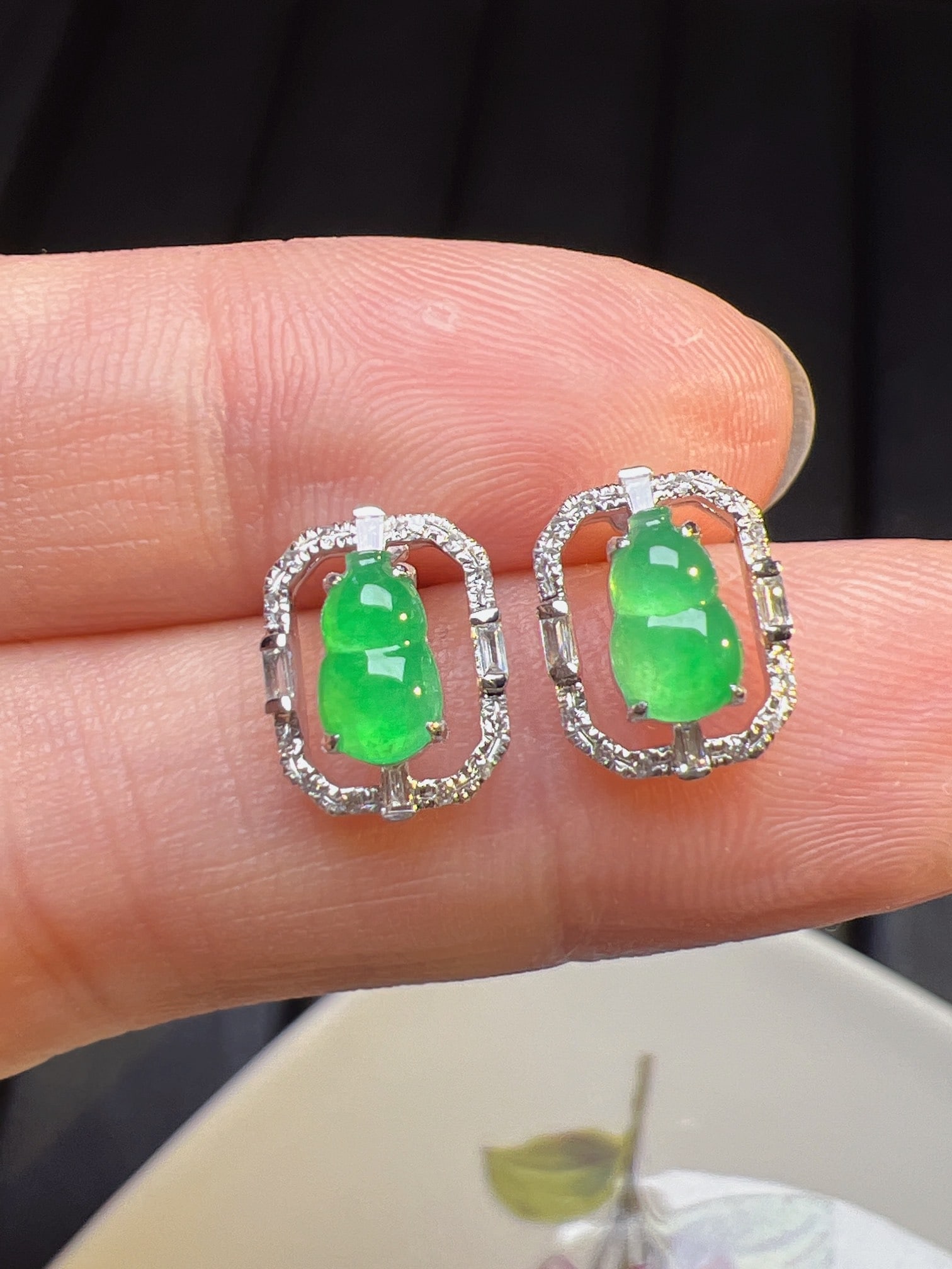 A Pair of Exquisite 18k Gold Diamond Inlaid Jadeite Earrings: A Pair of Exquisite 18k Gold Diamond Inlaid Jadeite Earrings,Size(Loose Stone):0.3inx0.2in 一对18k金钻镶嵌翡翠耳钉