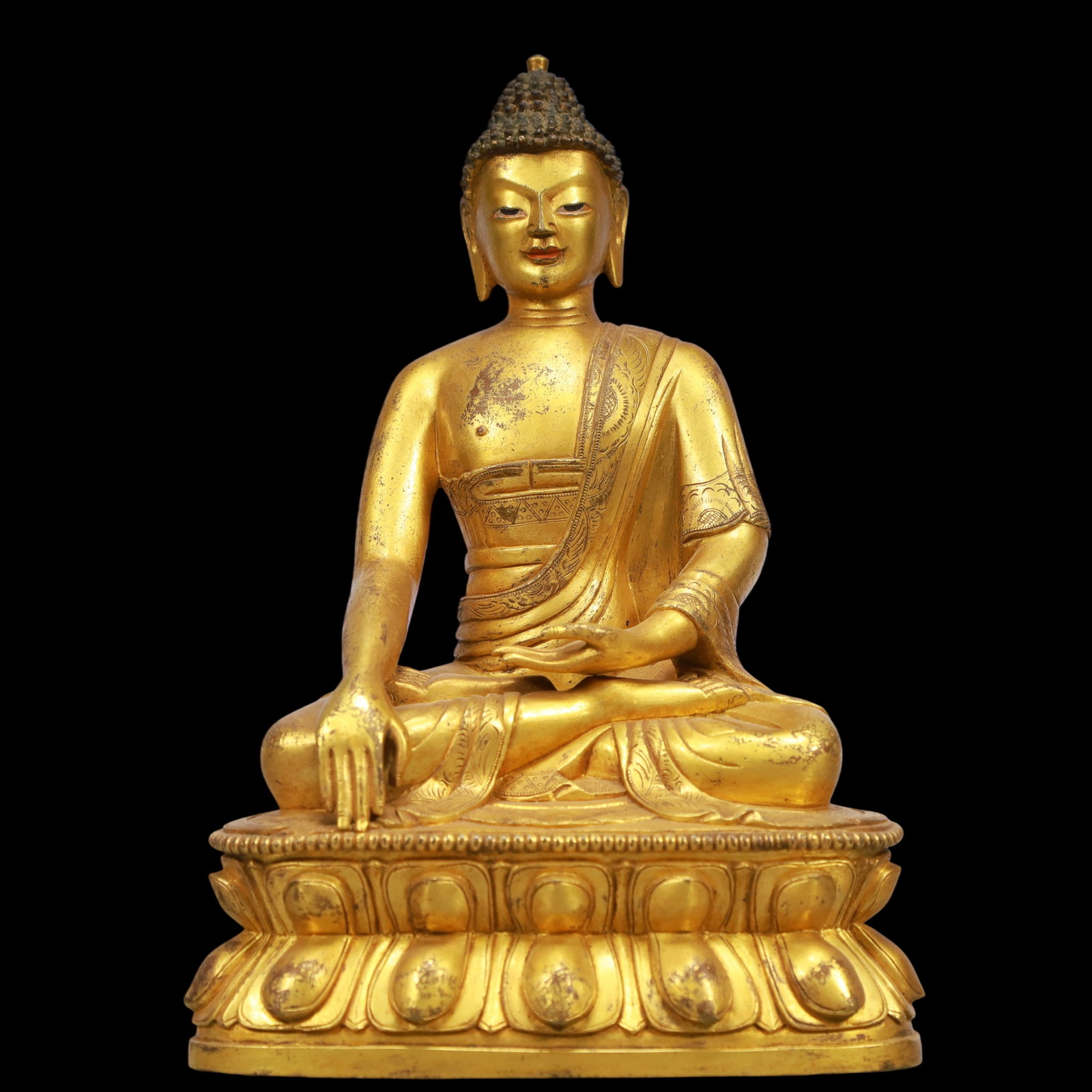 An Exquisite Gilt Bronze Statue of Sakyamuni: An Exquisite Gilt Bronze Statue of Sakyamuni Ming Dynasty, China Size:5.5inx3.9inx8.3in Weight:2150g铜鎏金释迦牟尼佛像 中国明